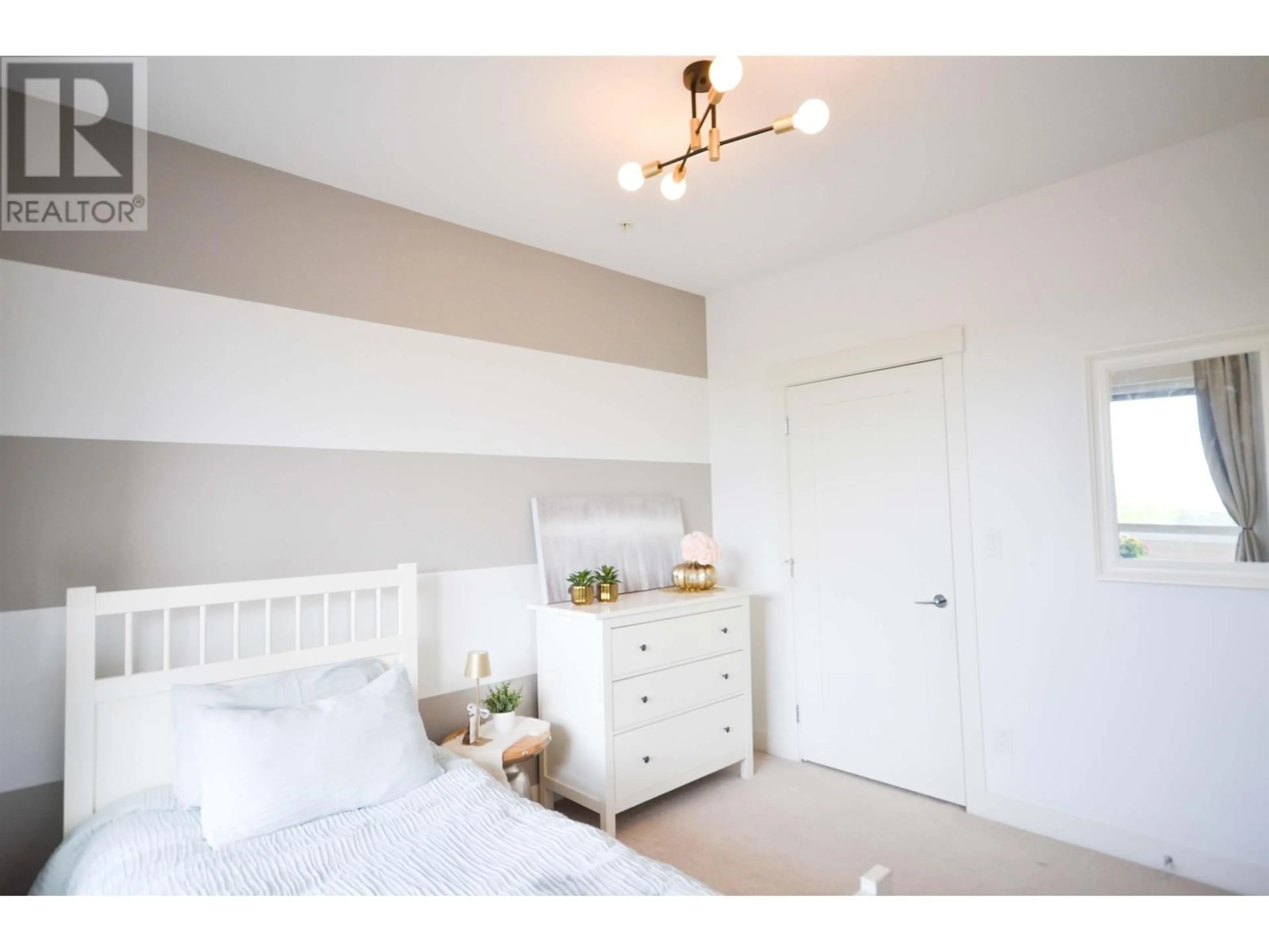 Bedroom with bed, wood/laminate floor for 204 - 827 RODERICK AVENUE, Coquitlam British Columbia V3K0E3