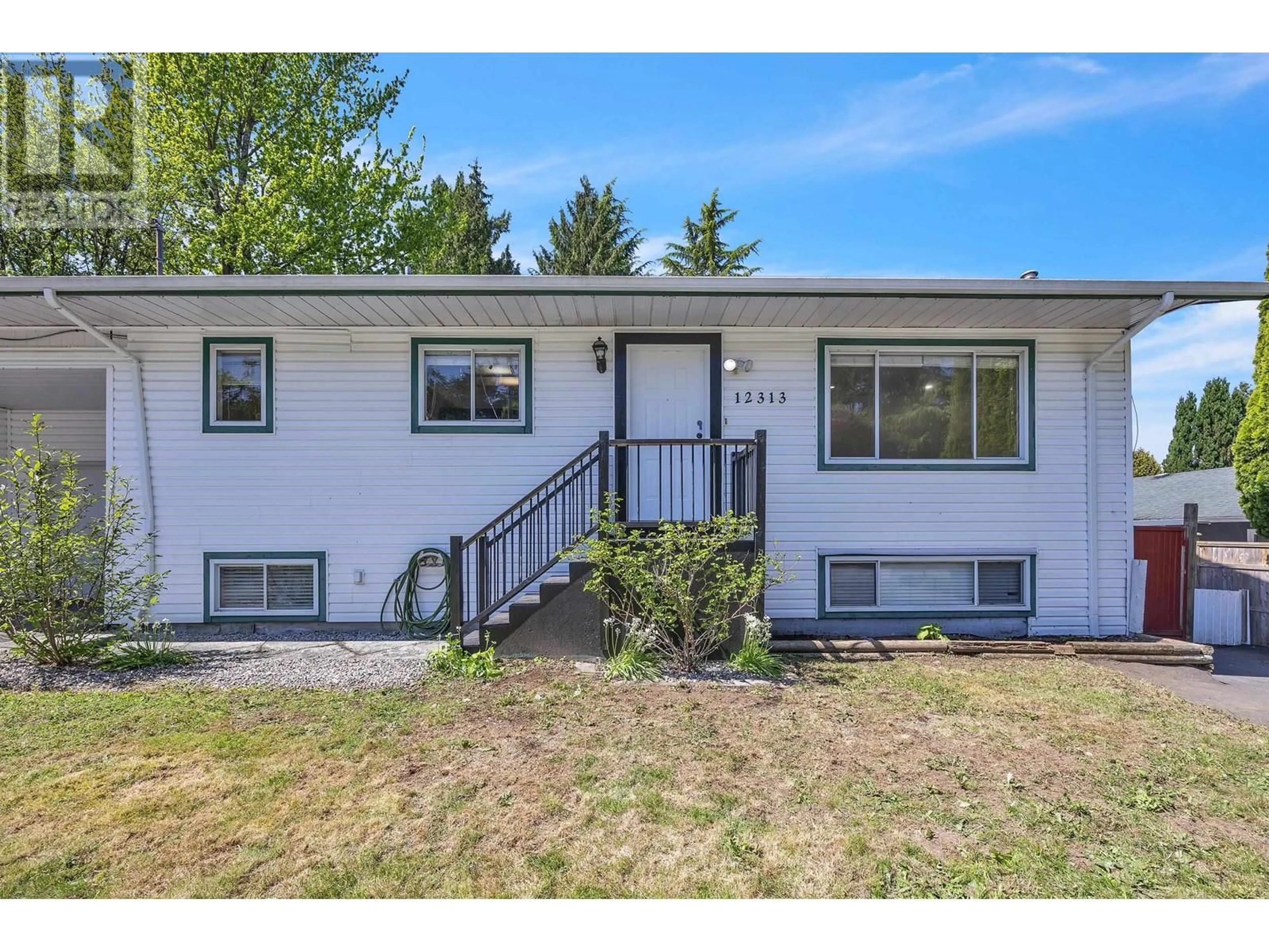 Home with vinyl exterior material, street for 12313 228 STREET, Maple Ridge British Columbia V2X6M5