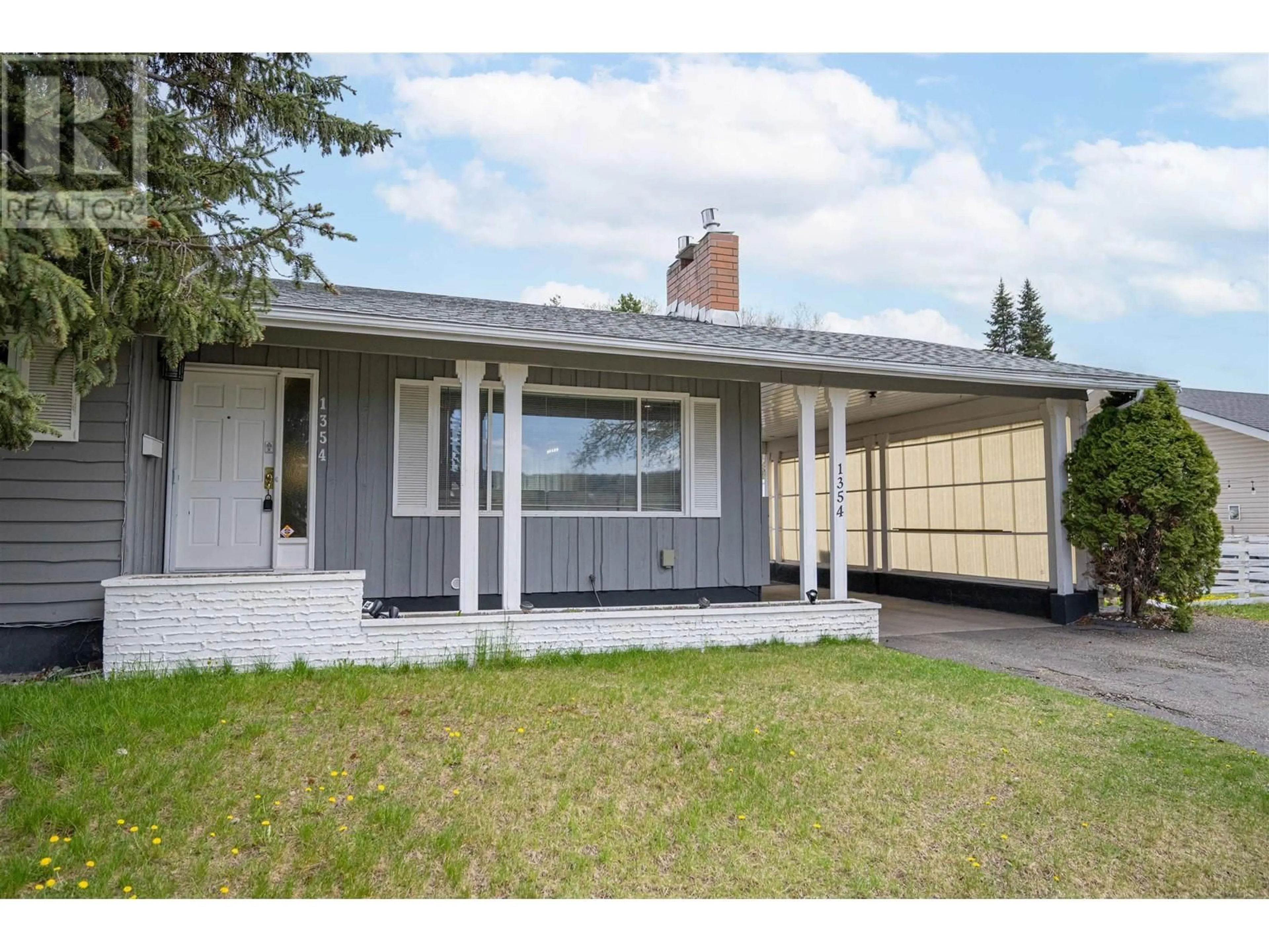 Home with vinyl exterior material, street for 1354 LIARD DRIVE, Prince George British Columbia V2M3Z7