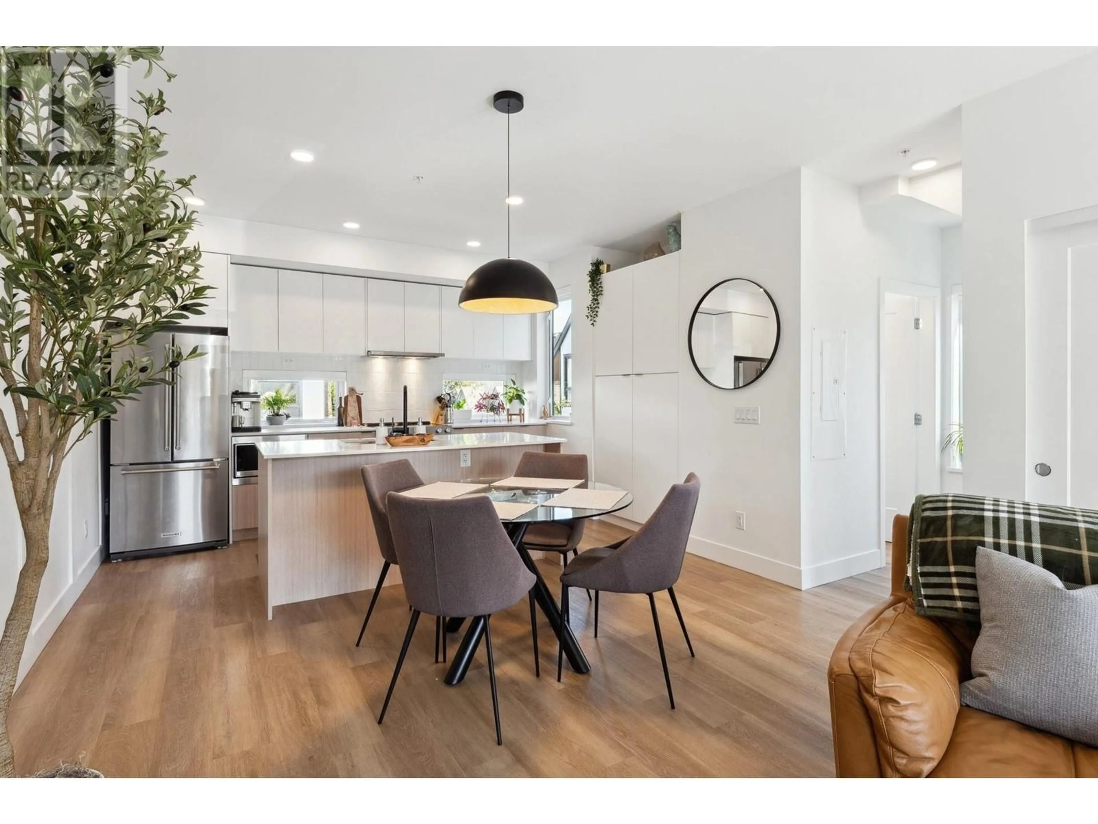 Open concept kitchen, wood/laminate floor for 212 - 1306 LAVAL SQUARE, Coquitlam British Columbia V3K0H4