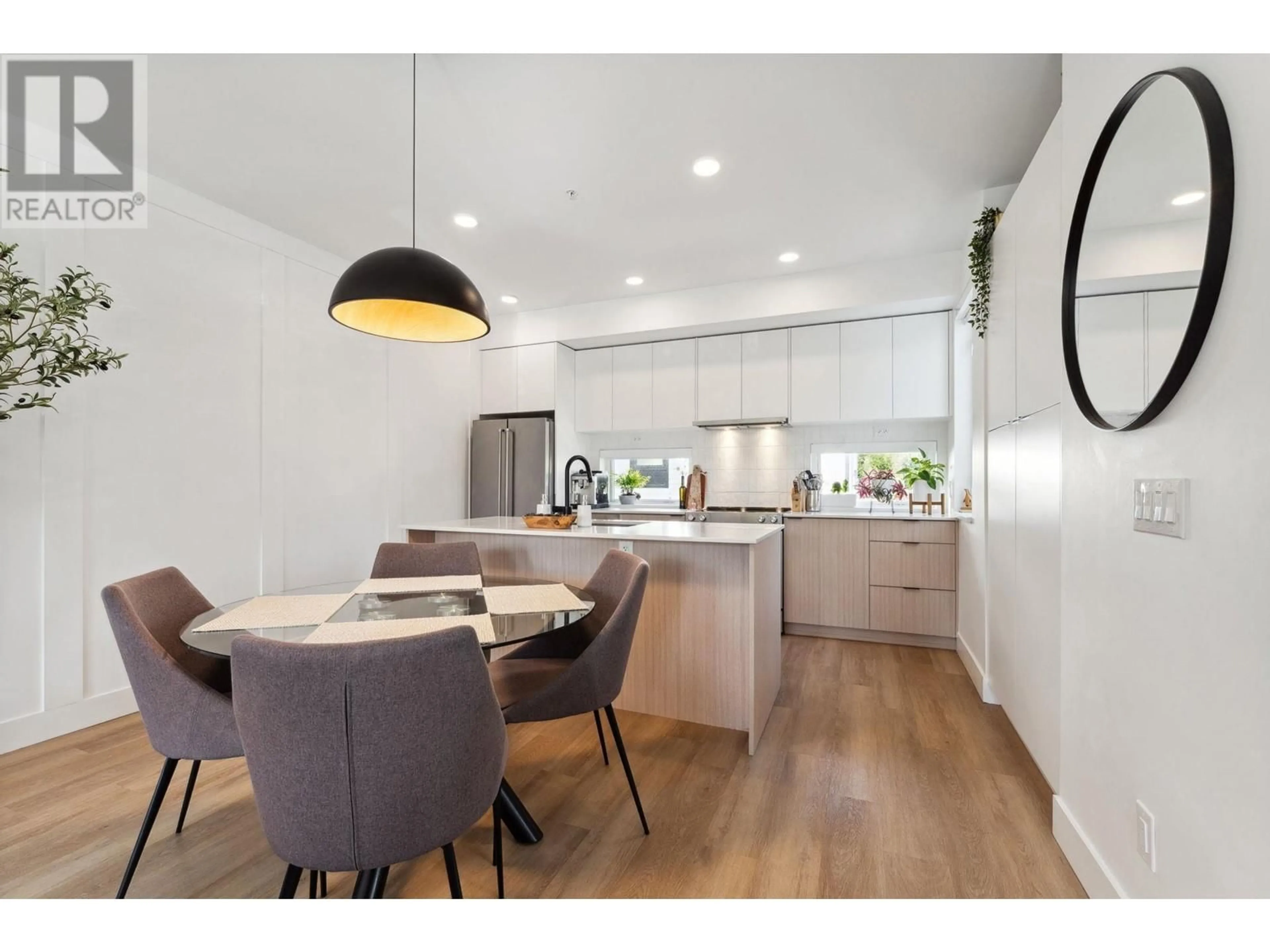 Open concept kitchen, wood/laminate floor for 212 - 1306 LAVAL SQUARE, Coquitlam British Columbia V3K0H4
