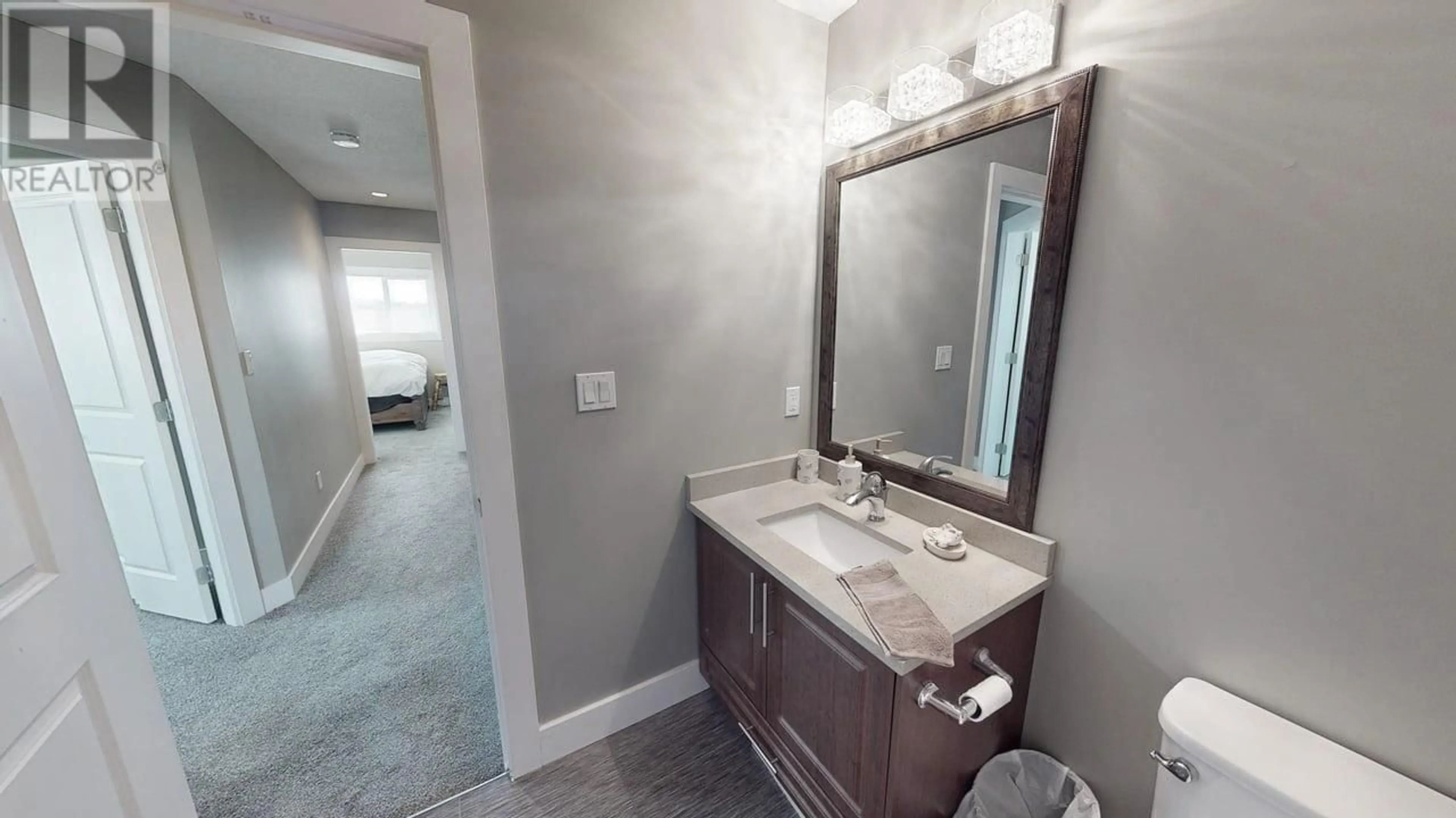 Standard bathroom, ceramic/tile floor for 8205 79A STREET, Fort St. John British Columbia V1J0P7