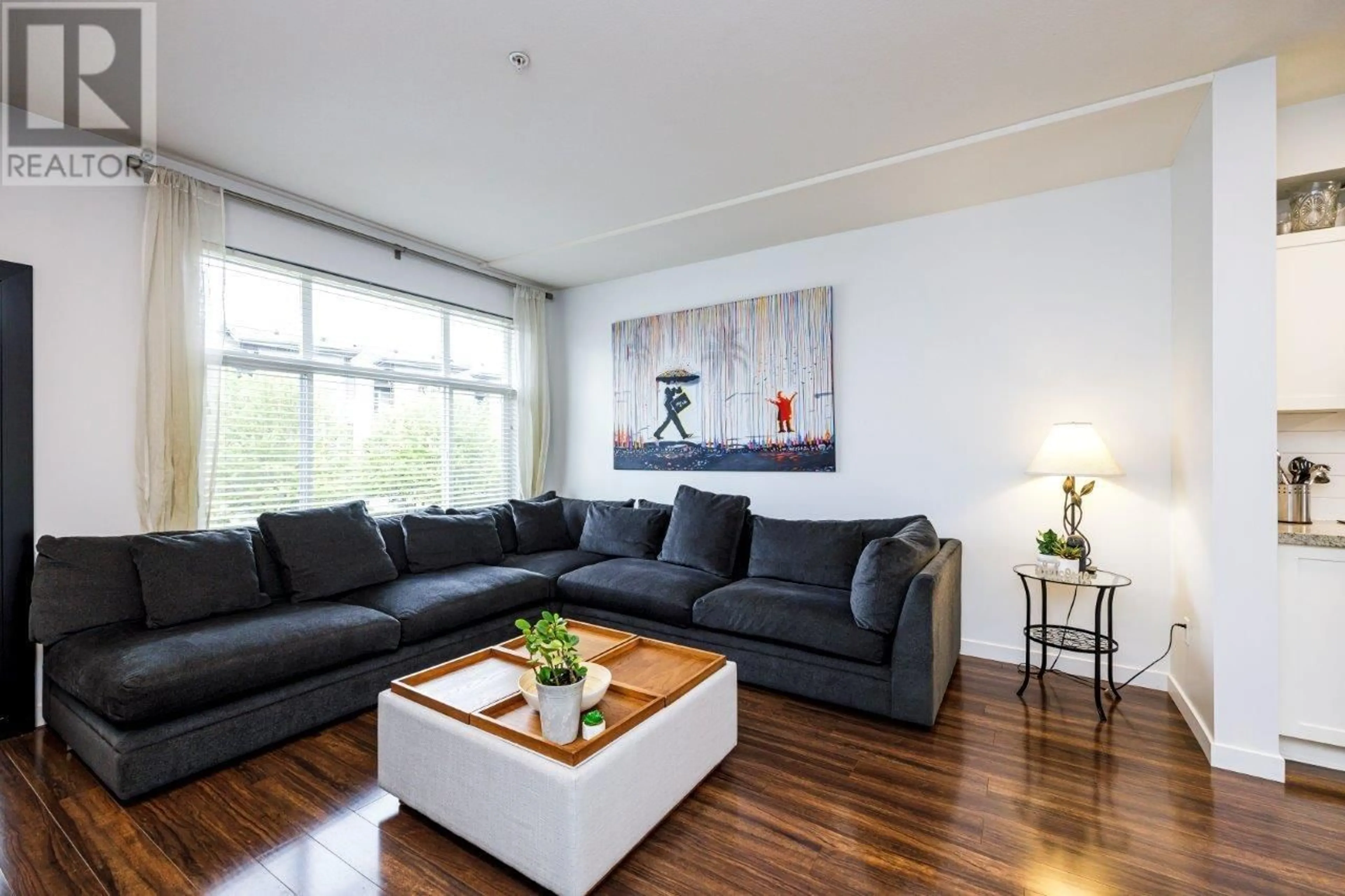Living room with furniture, wood/laminate floor for 712 ORWELL STREET, North Vancouver British Columbia V7J0A5
