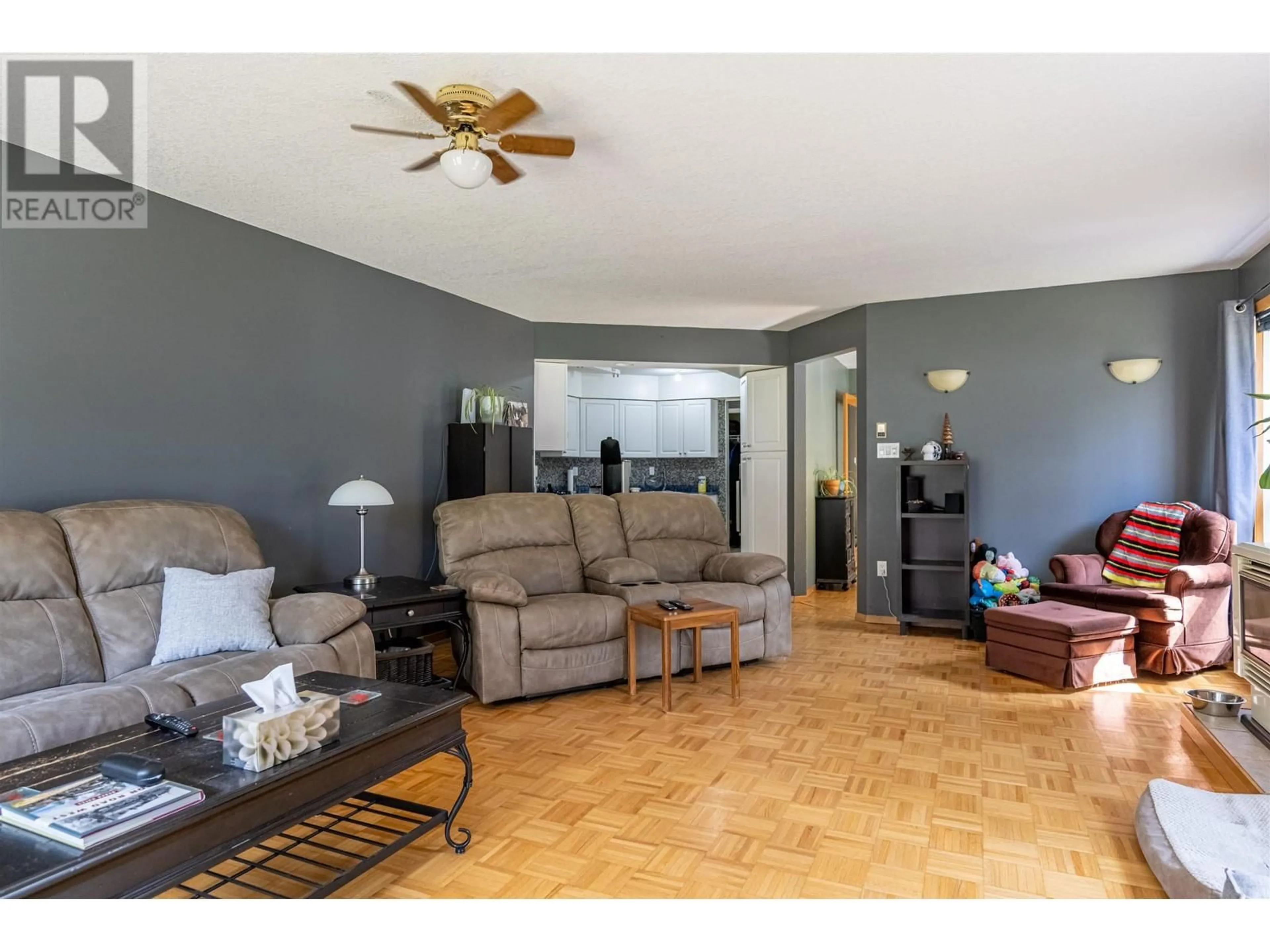Living room with furniture, wood/laminate floor for 24660 NESSVIEW ROAD, Prince George British Columbia V2K5M7