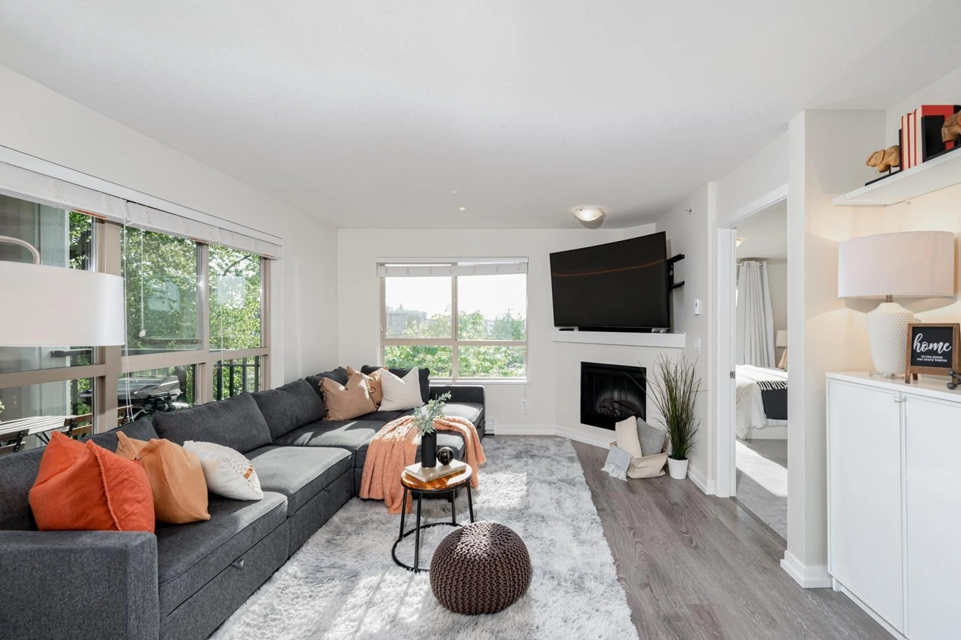 Living room with furniture, wood/laminate floor for C405 - 8929 202, Langley British Columbia V1M0B4