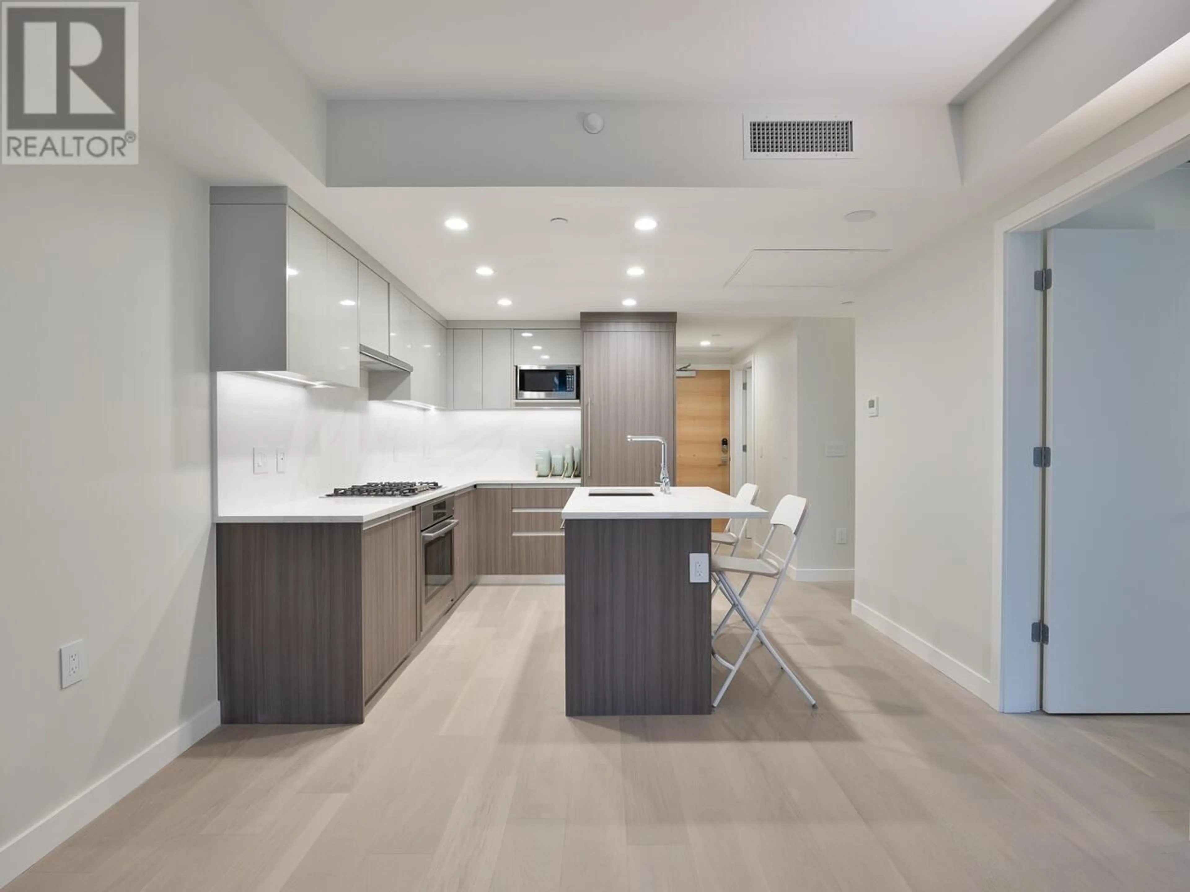 Open concept kitchen, unknown for 103 - 485 WEST 63RD AVENUE, Vancouver British Columbia V5X2J3