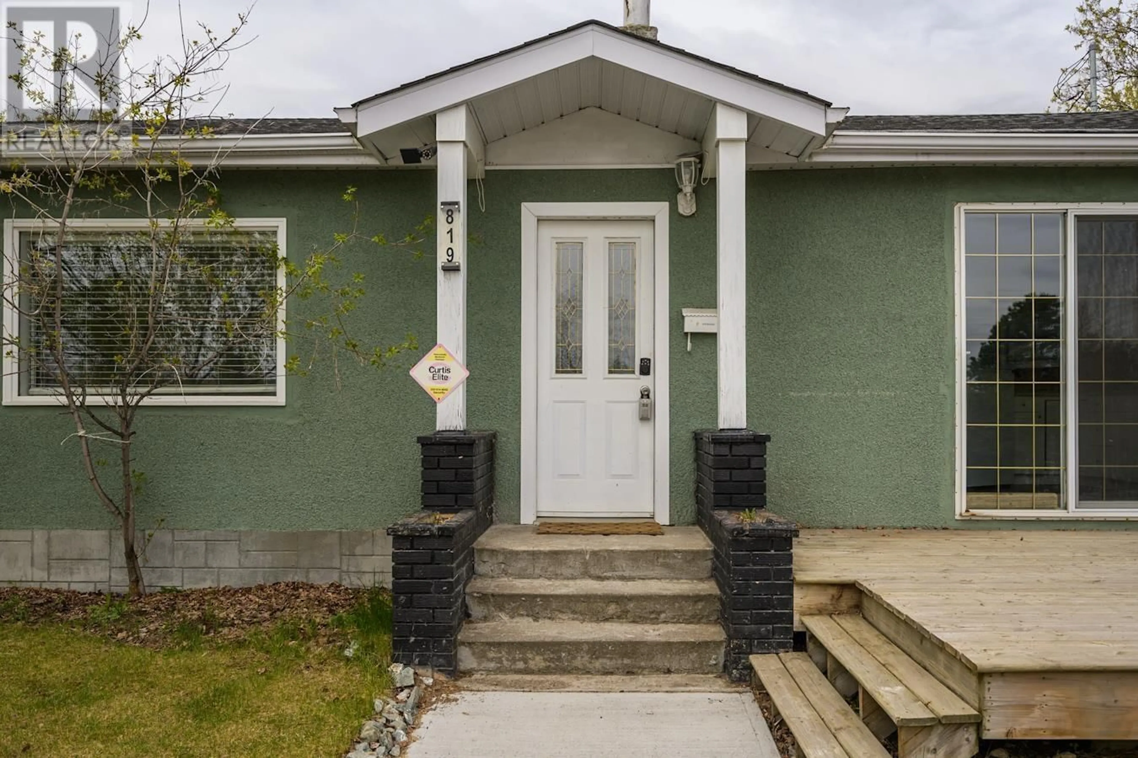 Home with vinyl exterior material, street for 819 GILLETT STREET, Prince George British Columbia V2M2V1