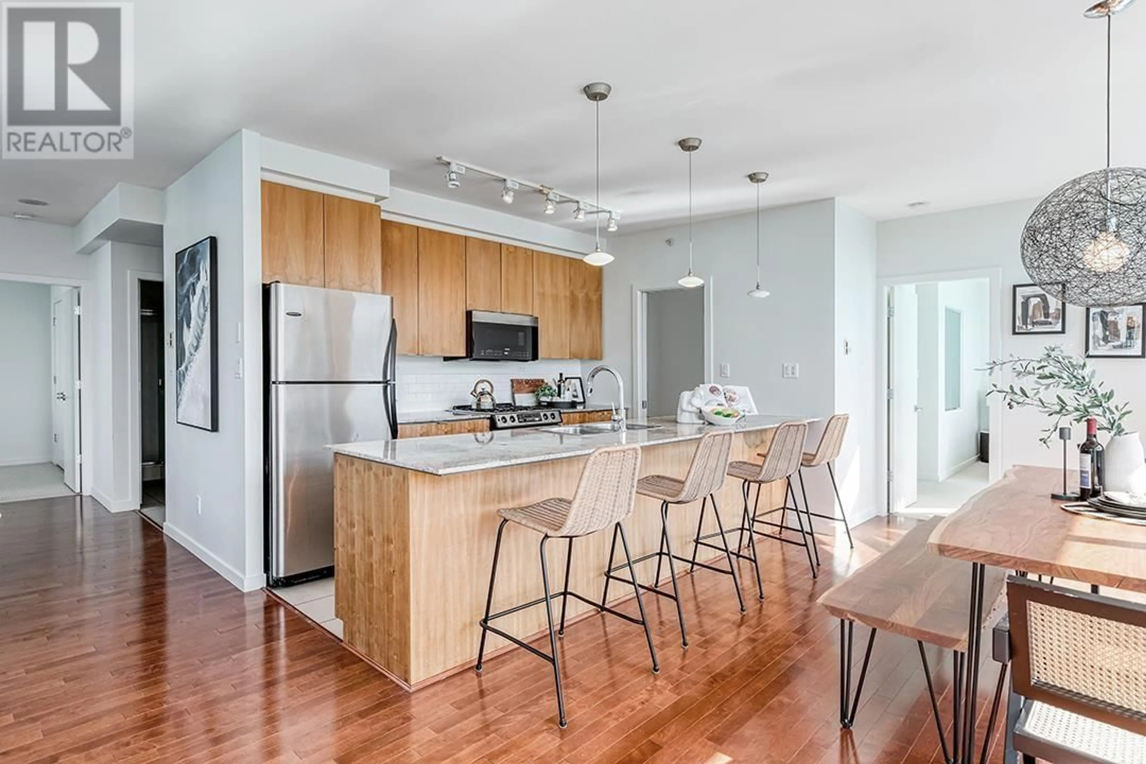 Open concept kitchen, wood/laminate floor for 2503 - 989 BEATTY STREET, Vancouver British Columbia V6Z3C2