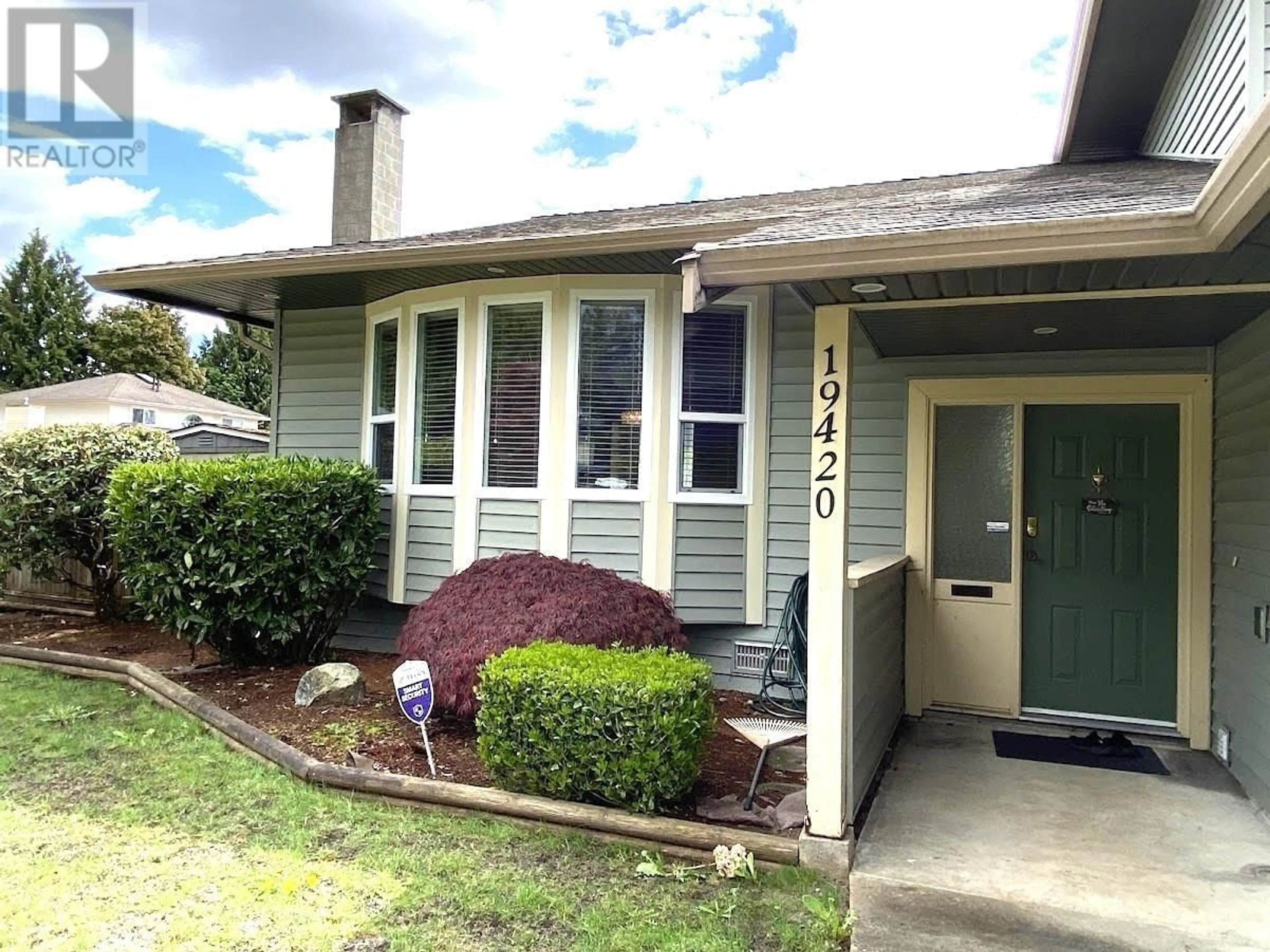 Home with vinyl exterior material, street for 19420 DAVISON ROAD, Pitt Meadows British Columbia V3Y1A3