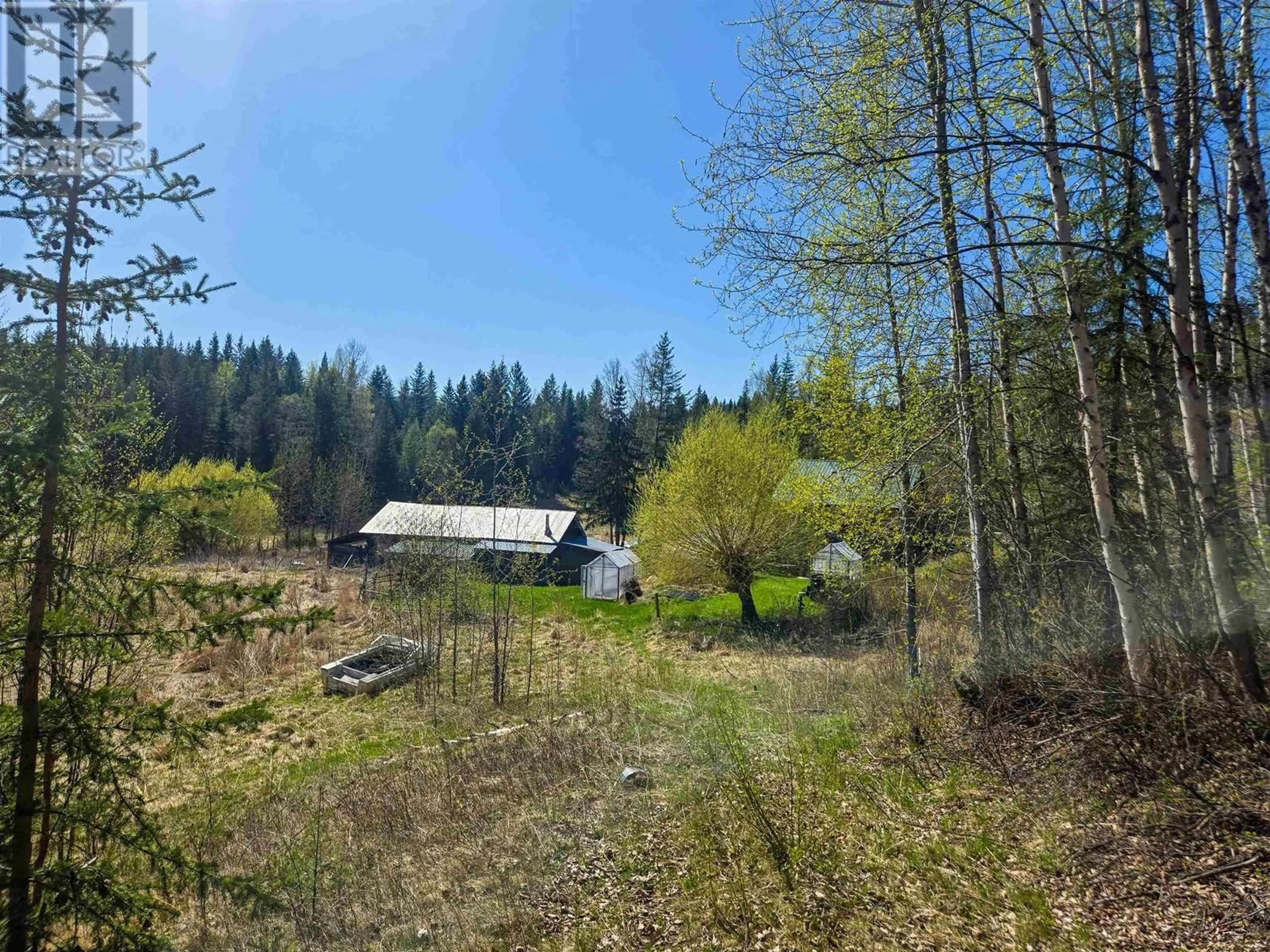 A pic from outside/outdoor area/front of a property/back of a property/a pic from drone, forest/trees view for 4014 CANIM-HENDRIX LAKE ROAD, Canim Lake British Columbia V0K1J0