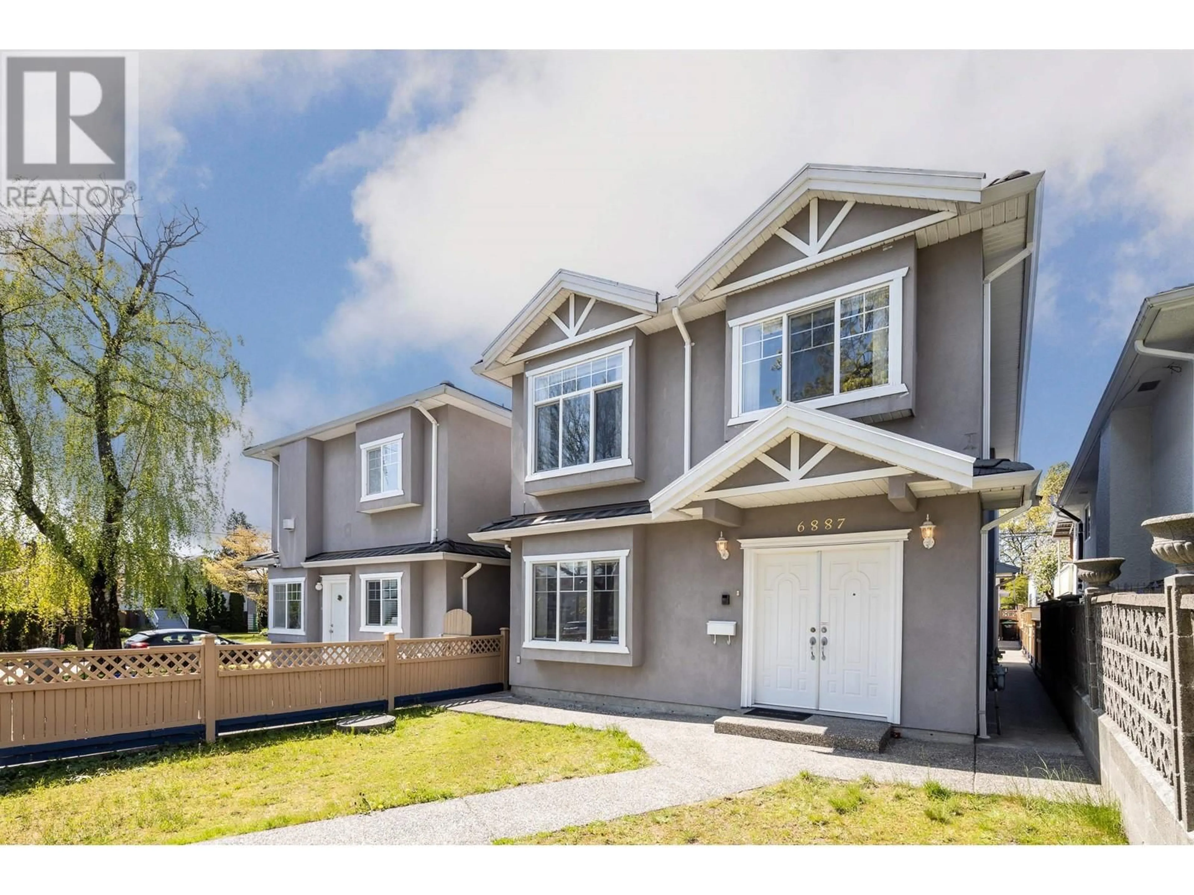Home with vinyl exterior material, street for 6887 SHERBROOKE STREET, Vancouver British Columbia V5X4C9