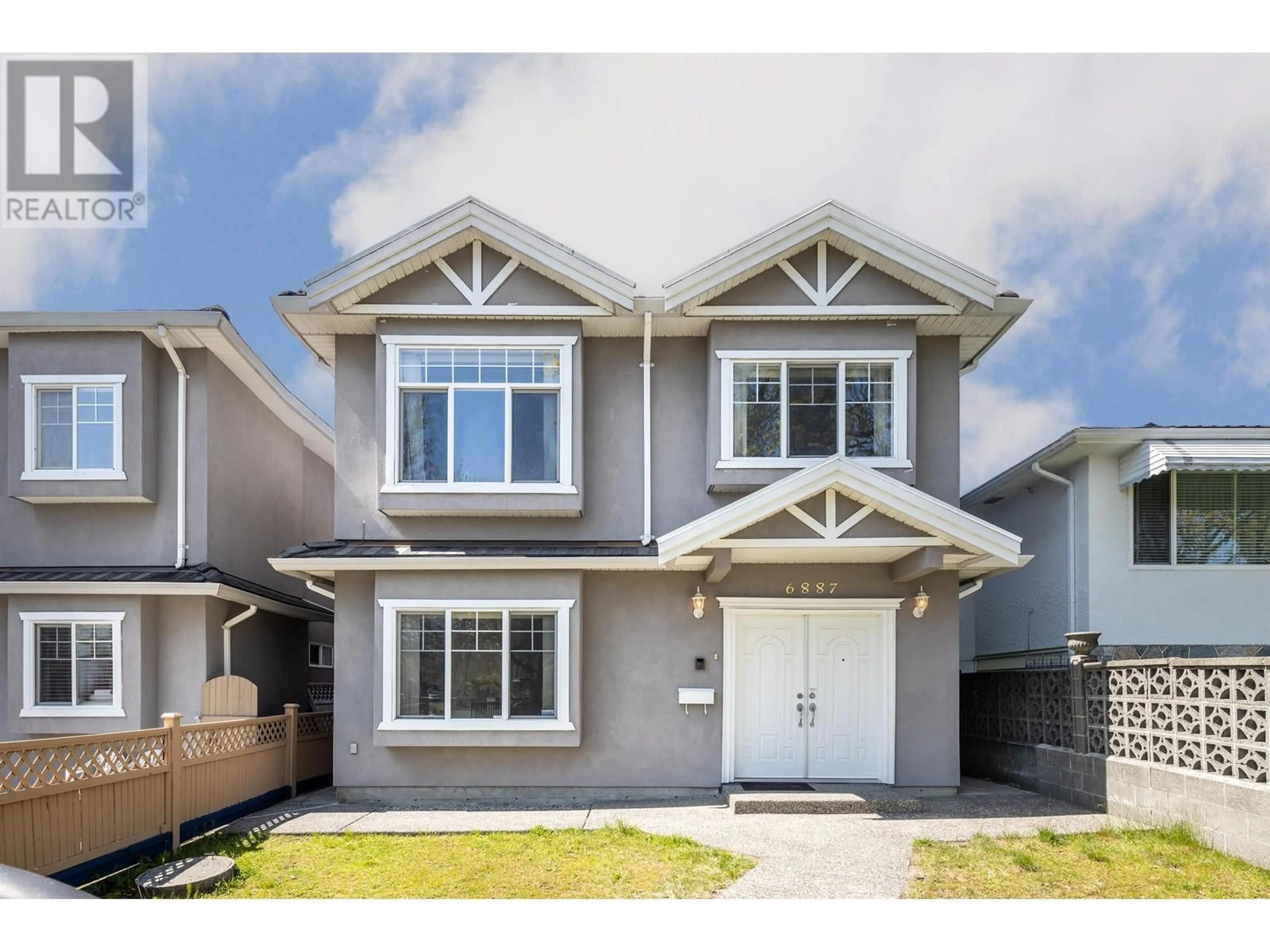 Home with vinyl exterior material, street for 6887 SHERBROOKE STREET, Vancouver British Columbia V5X4C9