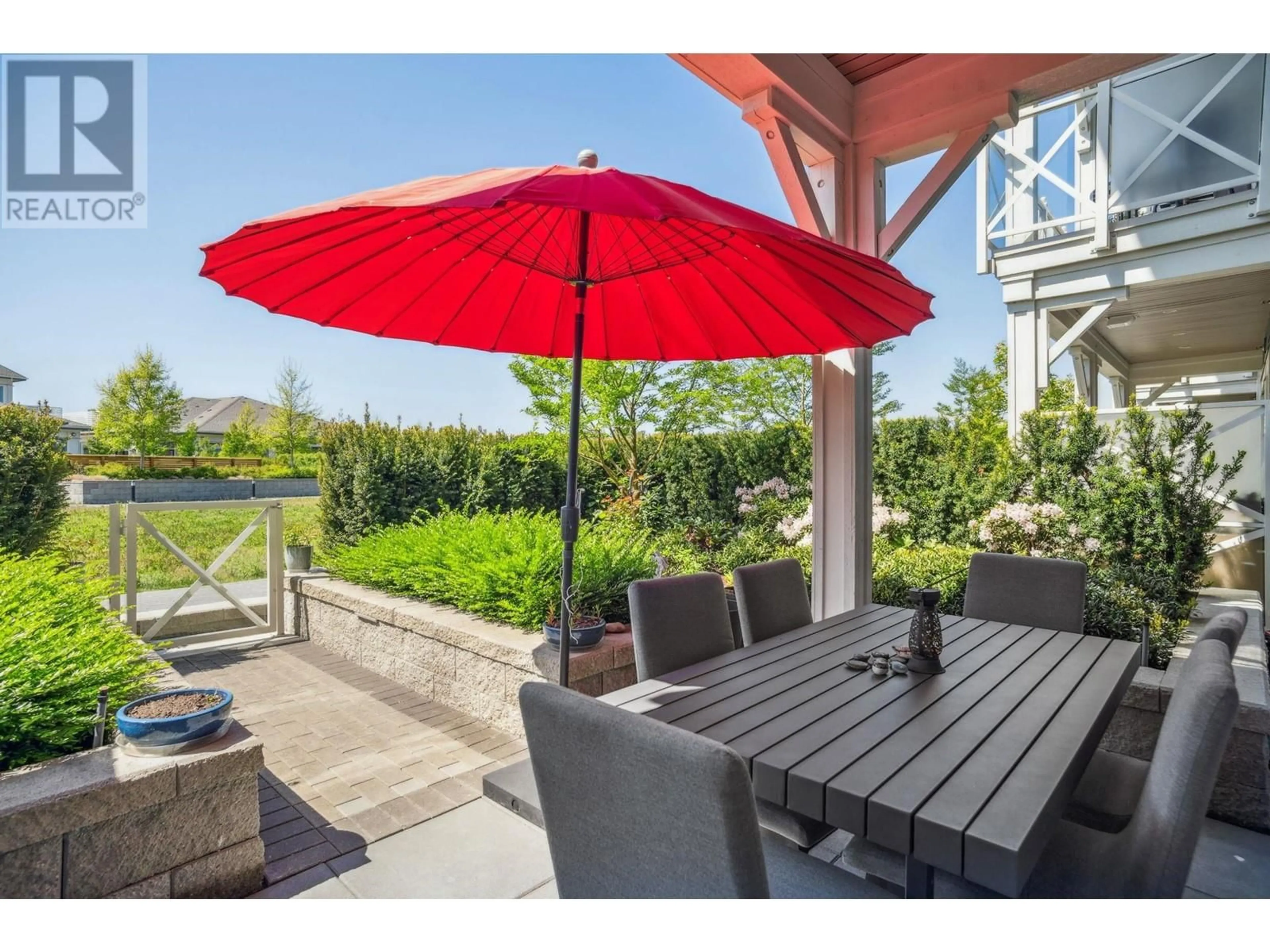 Patio, water/lake/river/ocean view for 104 - 5535 ADMIRAL WAY, Ladner British Columbia V4K0E3