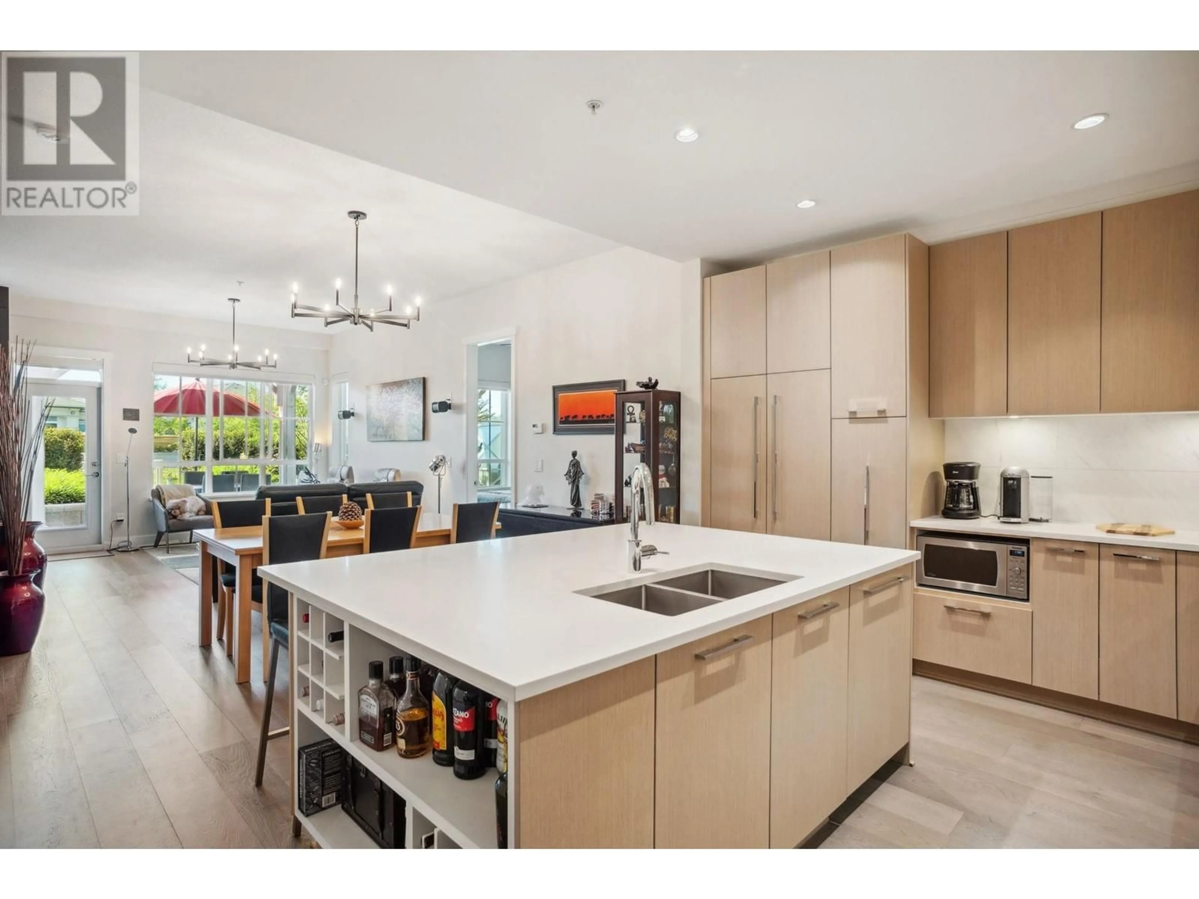 Open concept kitchen, ceramic/tile floor for 104 - 5535 ADMIRAL WAY, Ladner British Columbia V4K0E3