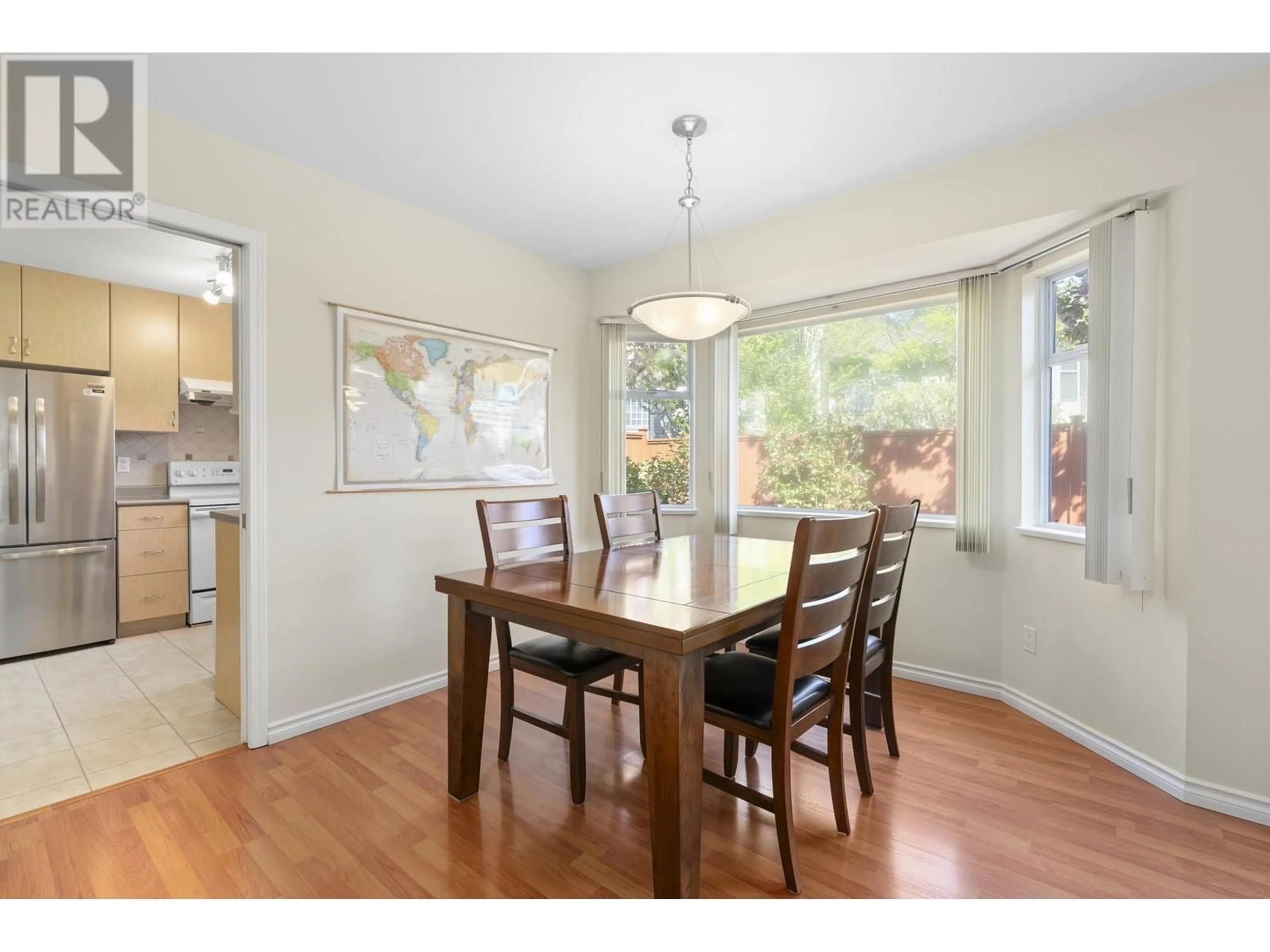 Dining room, wood/laminate floor for 4 - 7640 GILBERT ROAD, Richmond British Columbia V7C3W2