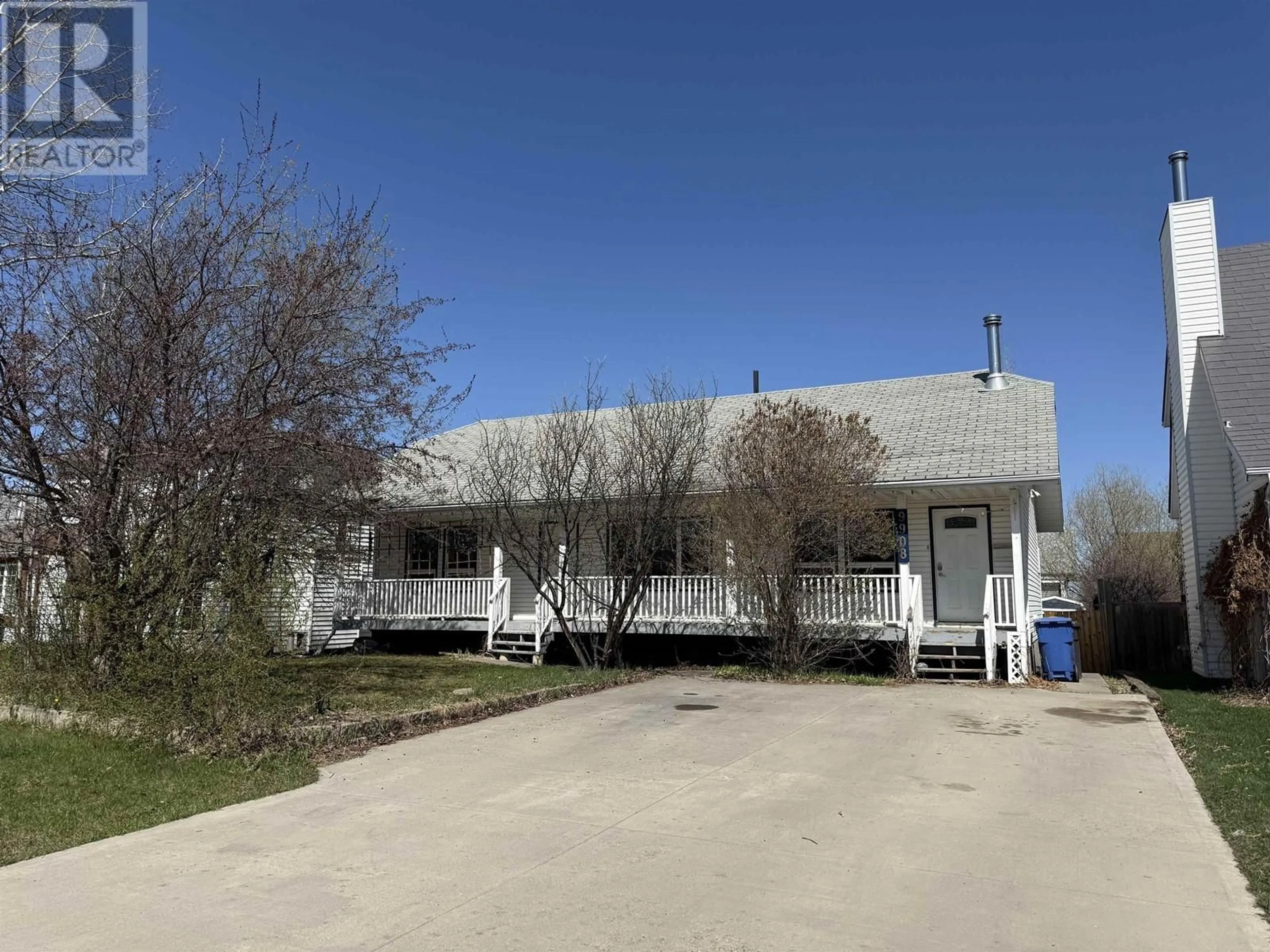 A pic from outside/outdoor area/front of a property/back of a property/a pic from drone, building for 9908 114 AVENUE, Fort St. John British Columbia V1J6L6