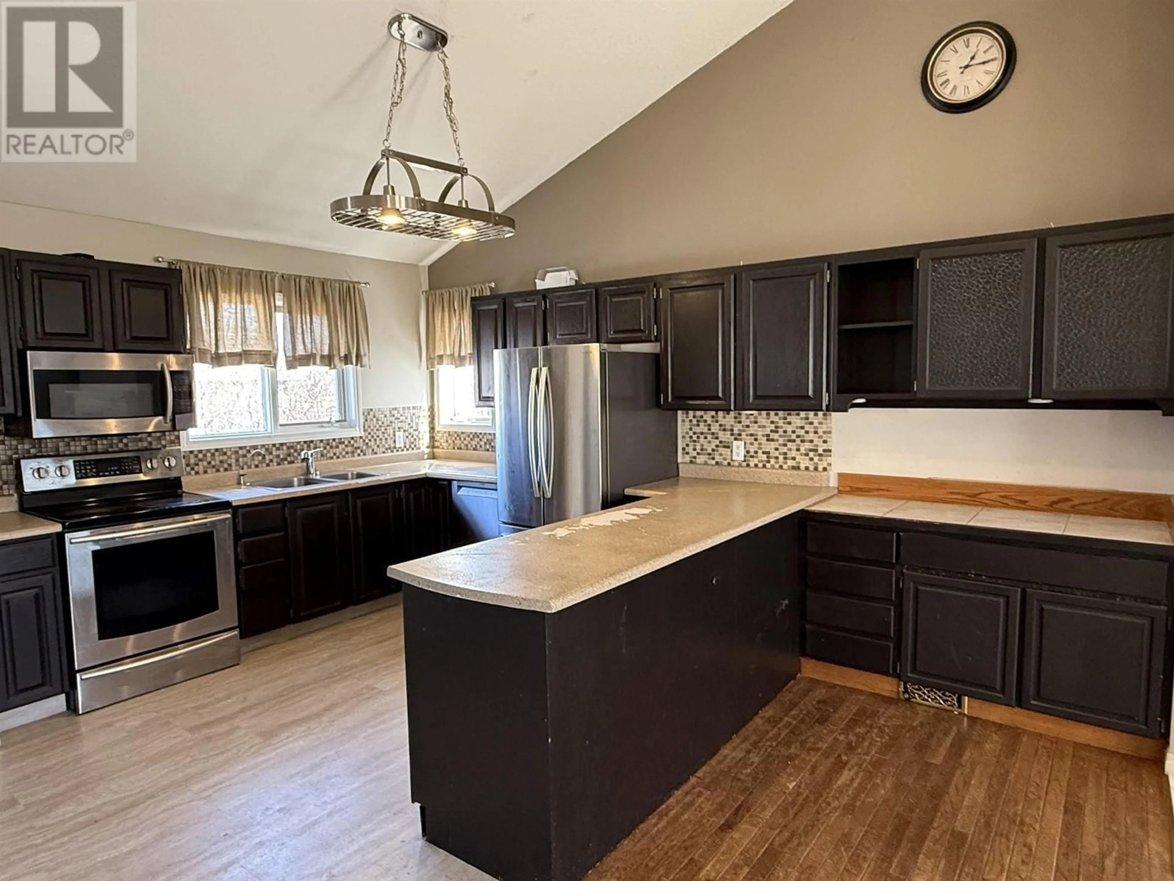 Open concept kitchen, unknown for 9908 114 AVENUE, Fort St. John British Columbia V1J6L6