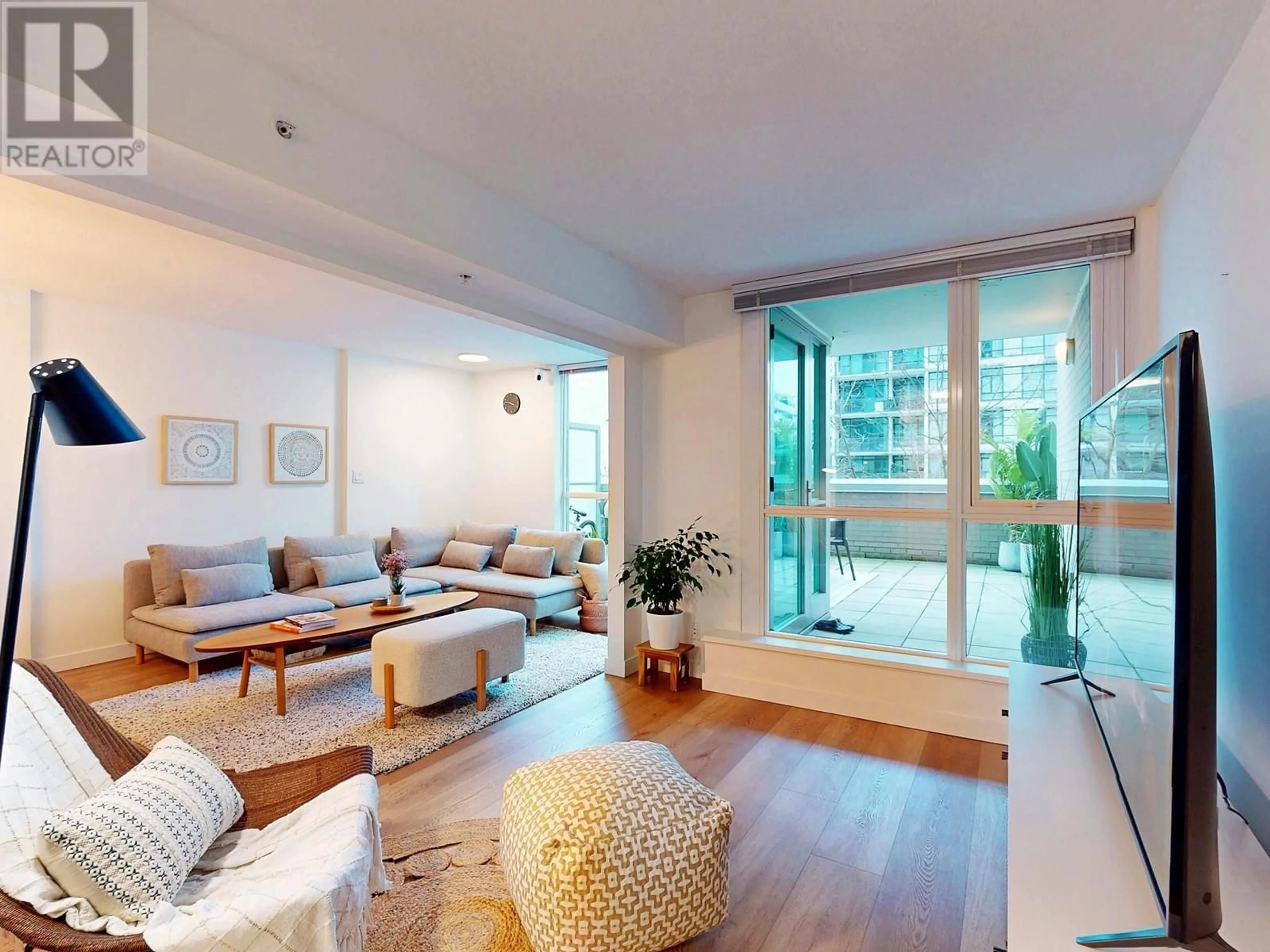Living room with furniture, unknown for 303 - 188 ESPLANADE, North Vancouver British Columbia V7L4Y1