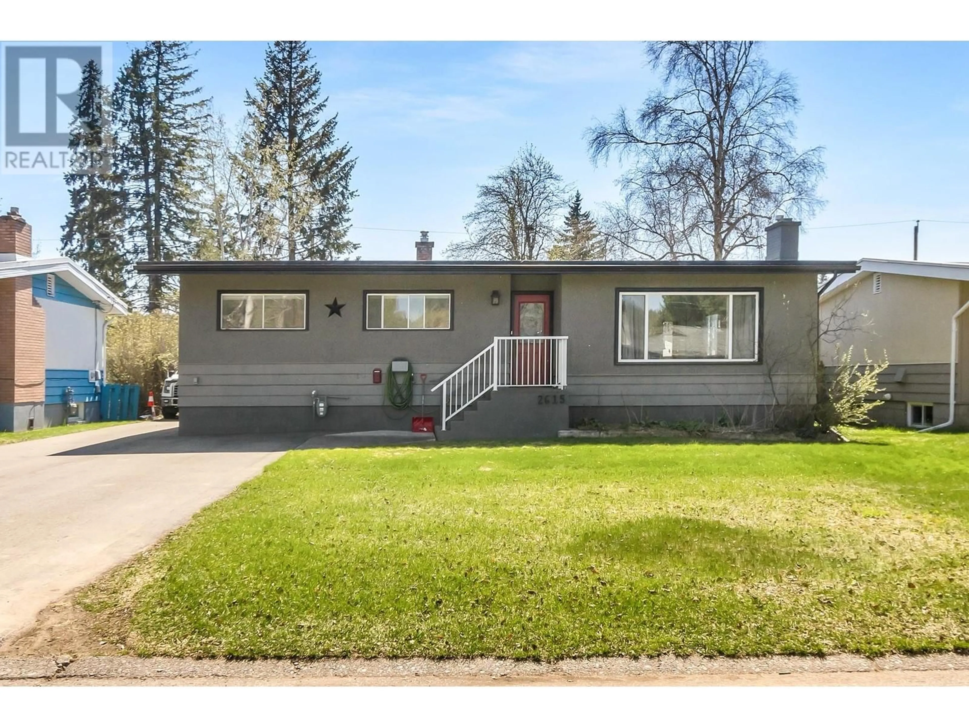 Home with vinyl exterior material, street for 2615 1ST AVENUE, Prince George British Columbia V2M1B6