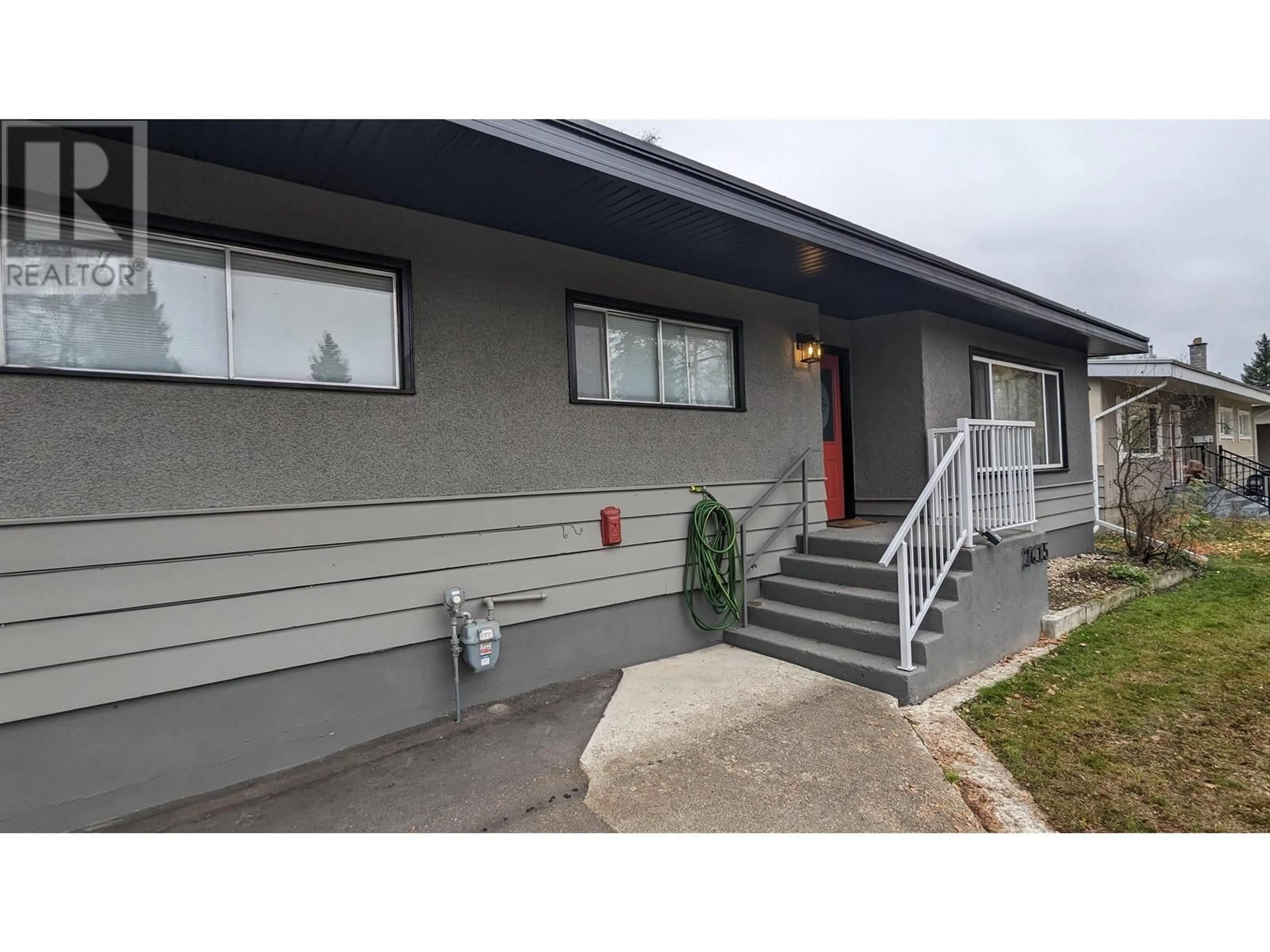 Home with vinyl exterior material, street for 2615 1ST AVENUE, Prince George British Columbia V2M1B6