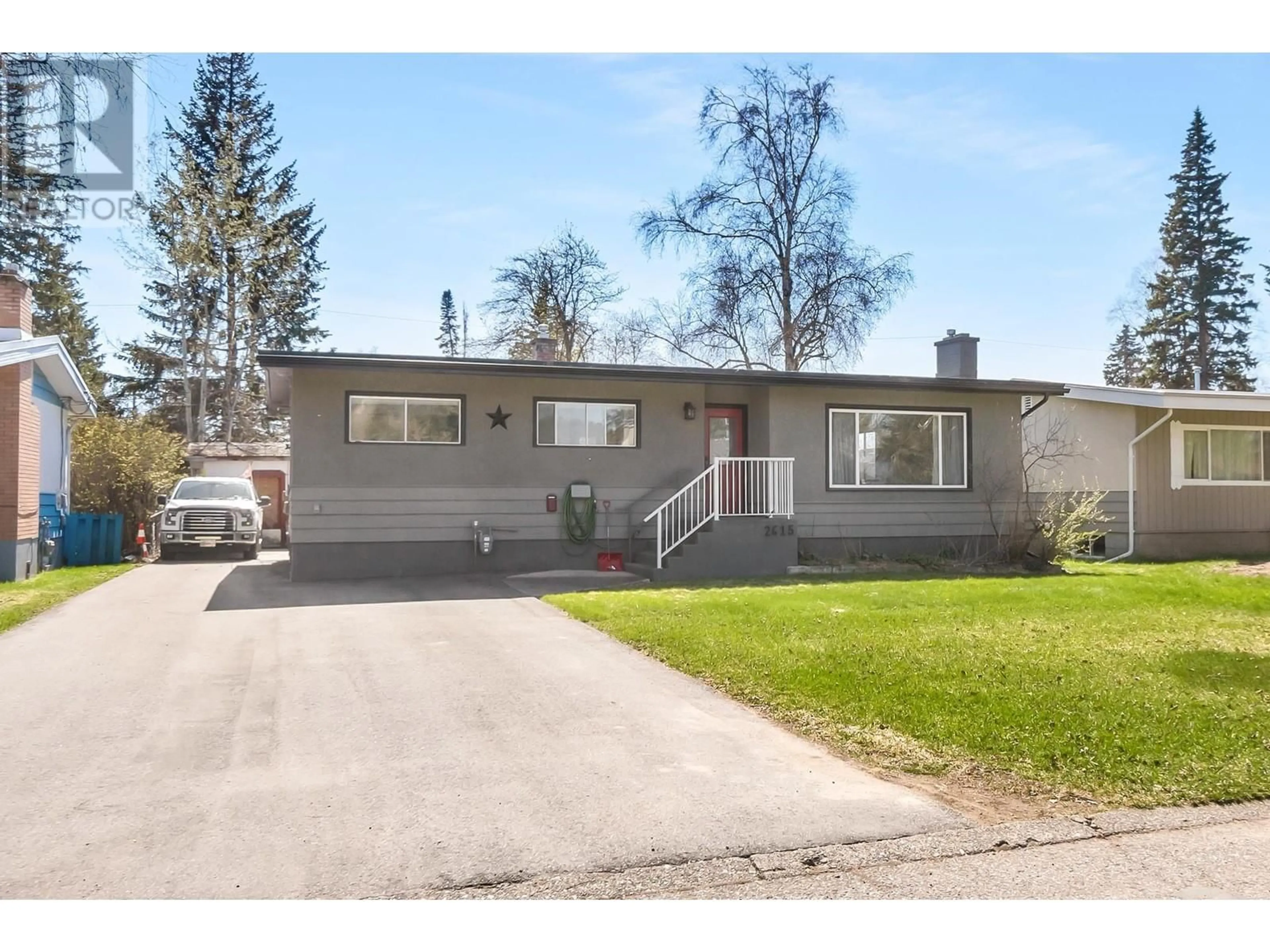 Home with vinyl exterior material, street for 2615 1ST AVENUE, Prince George British Columbia V2M1B6