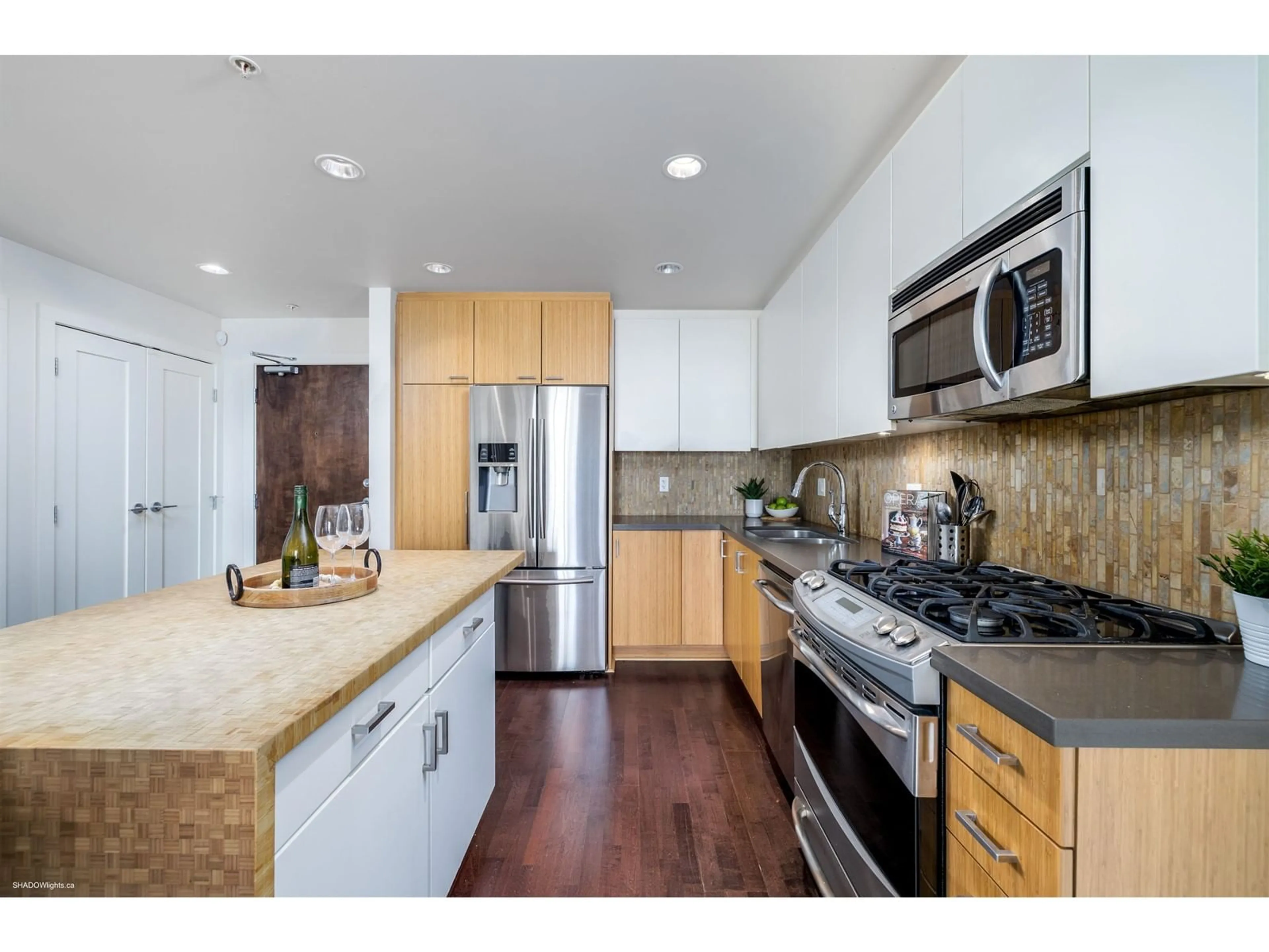 Open concept kitchen, unknown for 214 - 15428 31, Surrey British Columbia V3Z3W4