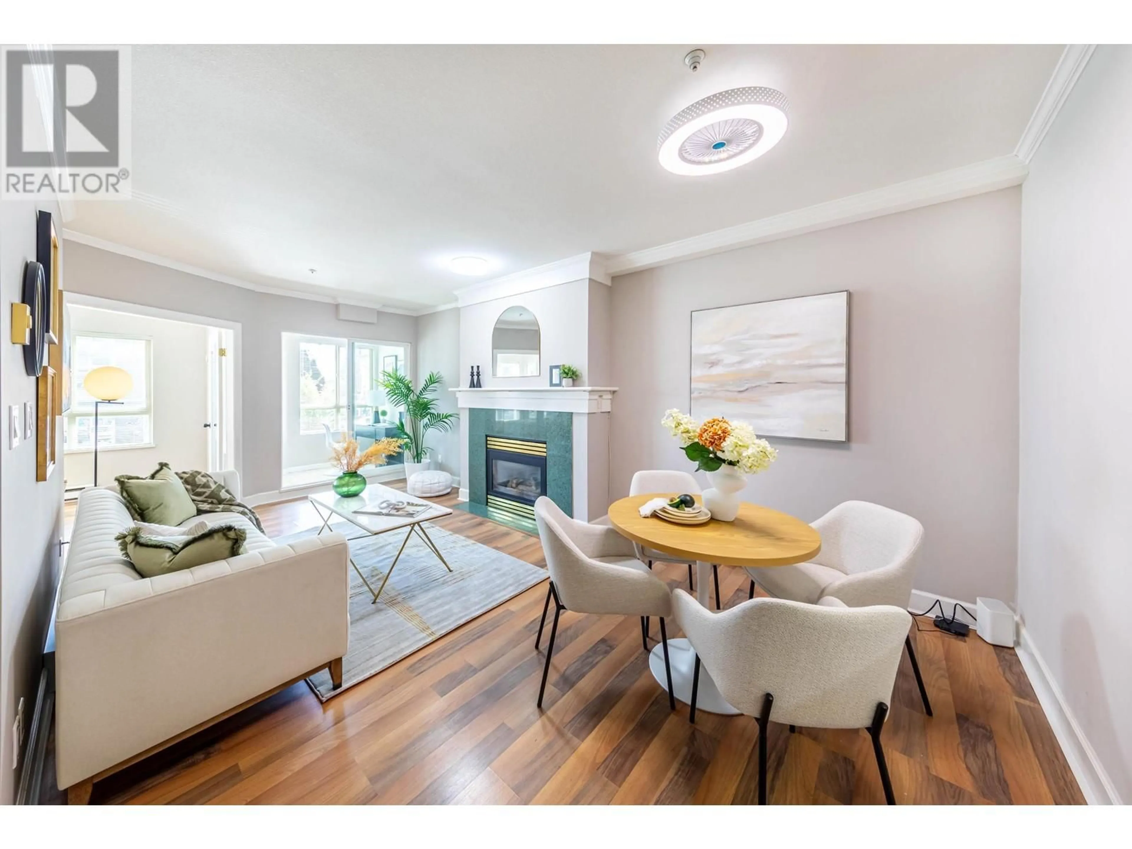 Living room with furniture, wood/laminate floor for 105 - 3615 17TH AVENUE, Vancouver British Columbia V6S1A3