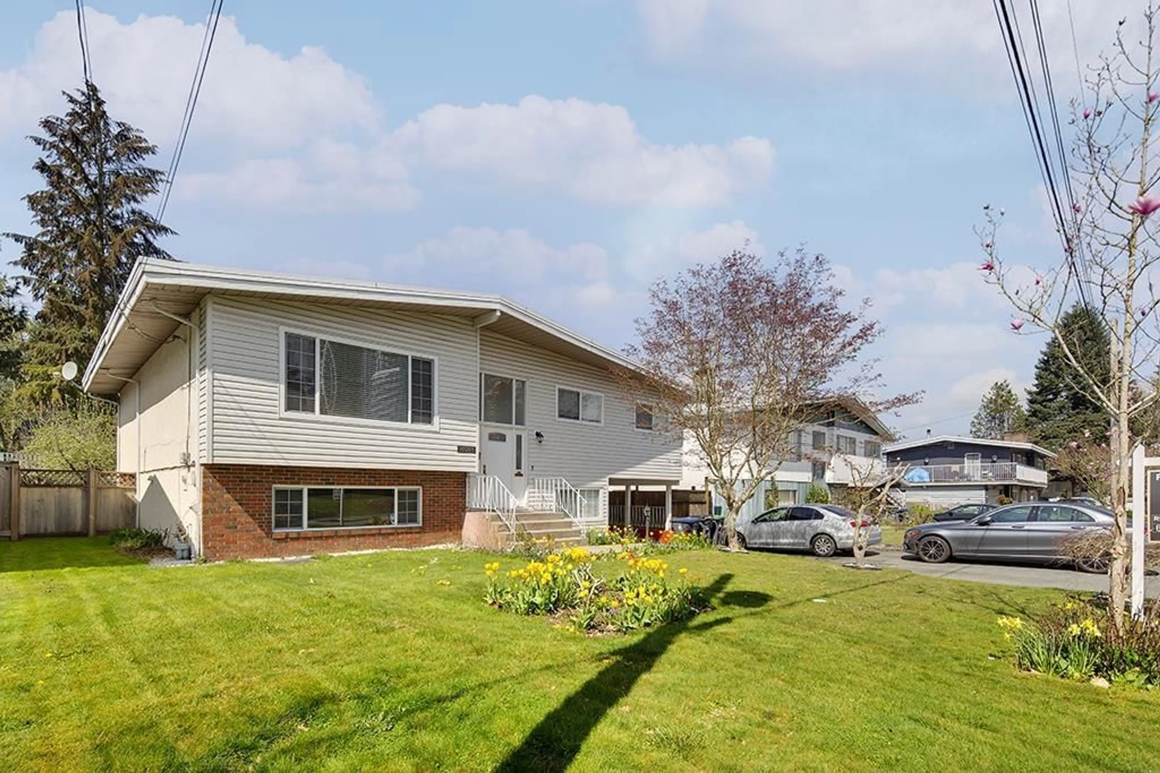 Home with vinyl exterior material, street for 10263 MICHEL, Surrey British Columbia V3T3R1