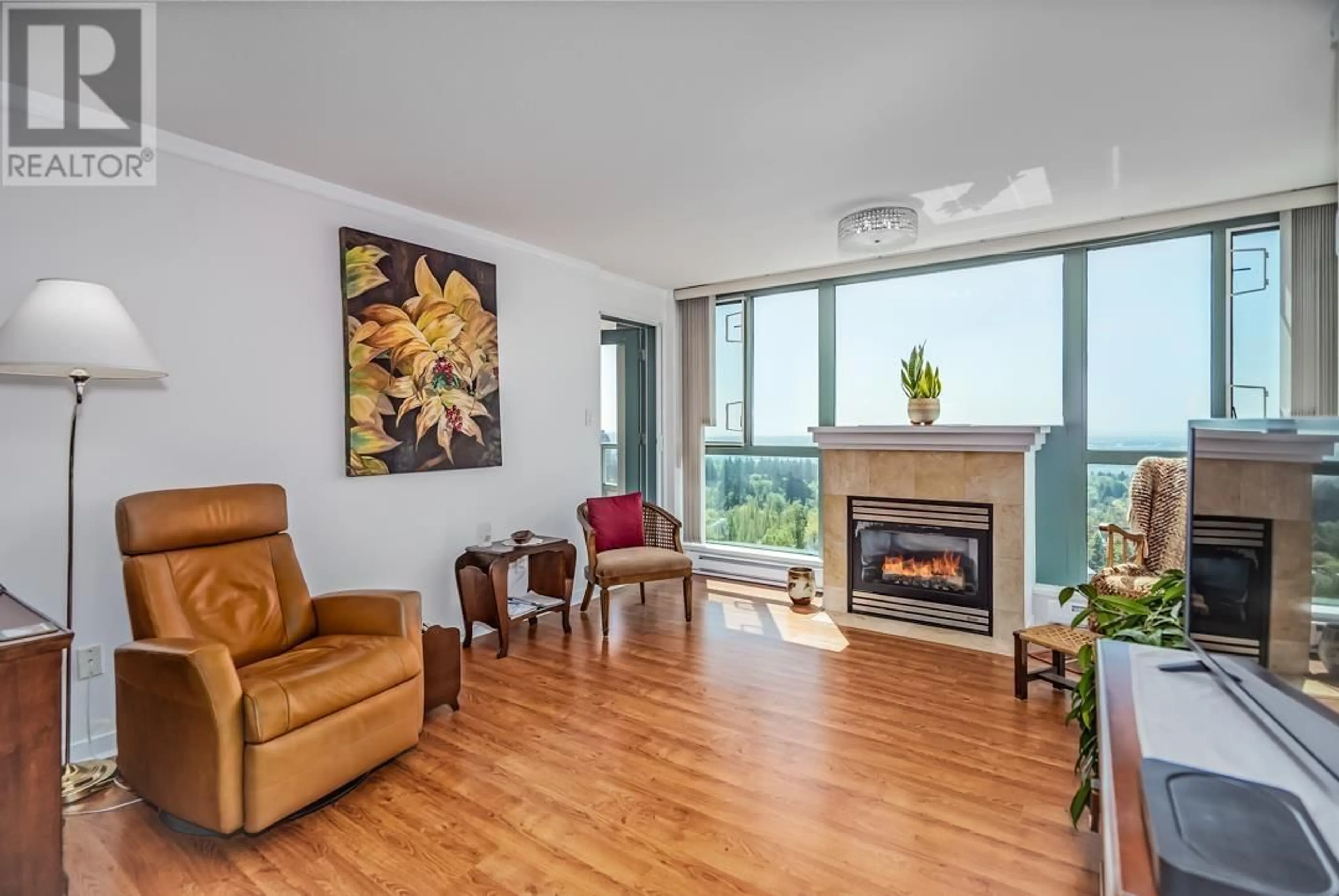 Living room with furniture, wood/laminate floor for 1404 - 6659 SOUTHOAKS CRESCENT, Burnaby British Columbia V5E4M9