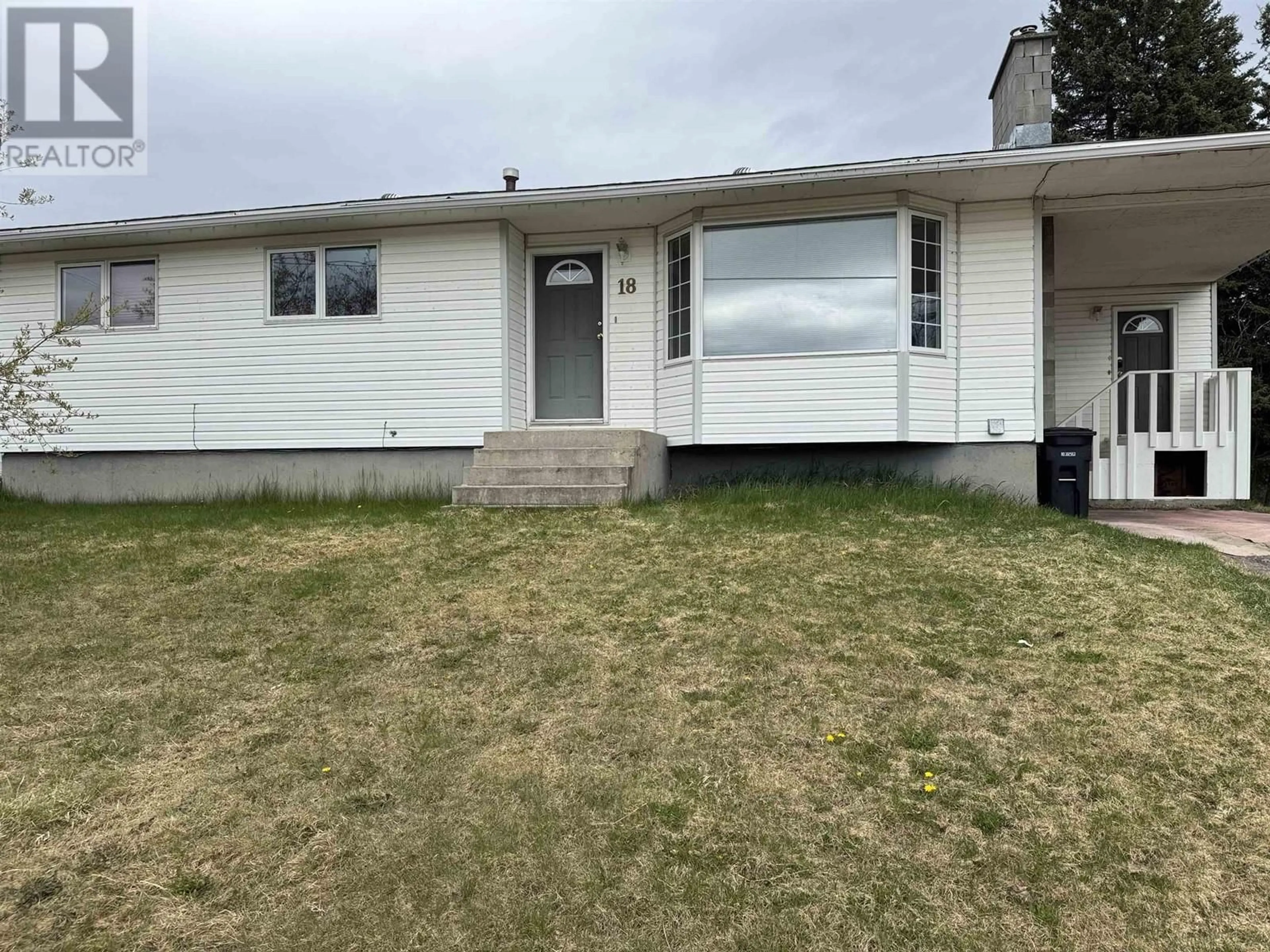 Home with vinyl exterior material, street for 18 TUTU AVENUE, Mackenzie British Columbia V0J2C0