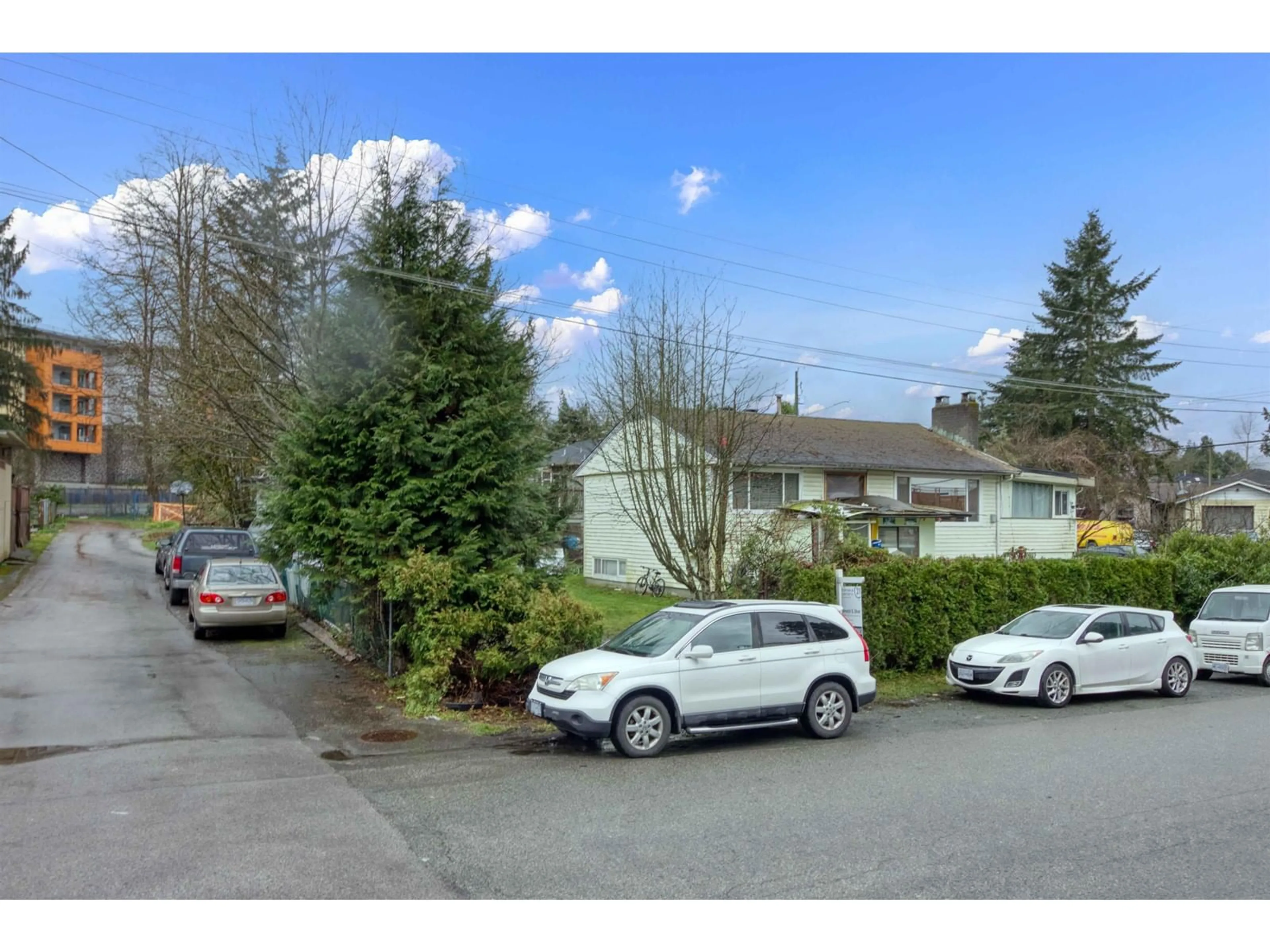 A pic from outside/outdoor area/front of a property/back of a property/a pic from drone, street for 10999 132A, Surrey British Columbia V3T3Y2