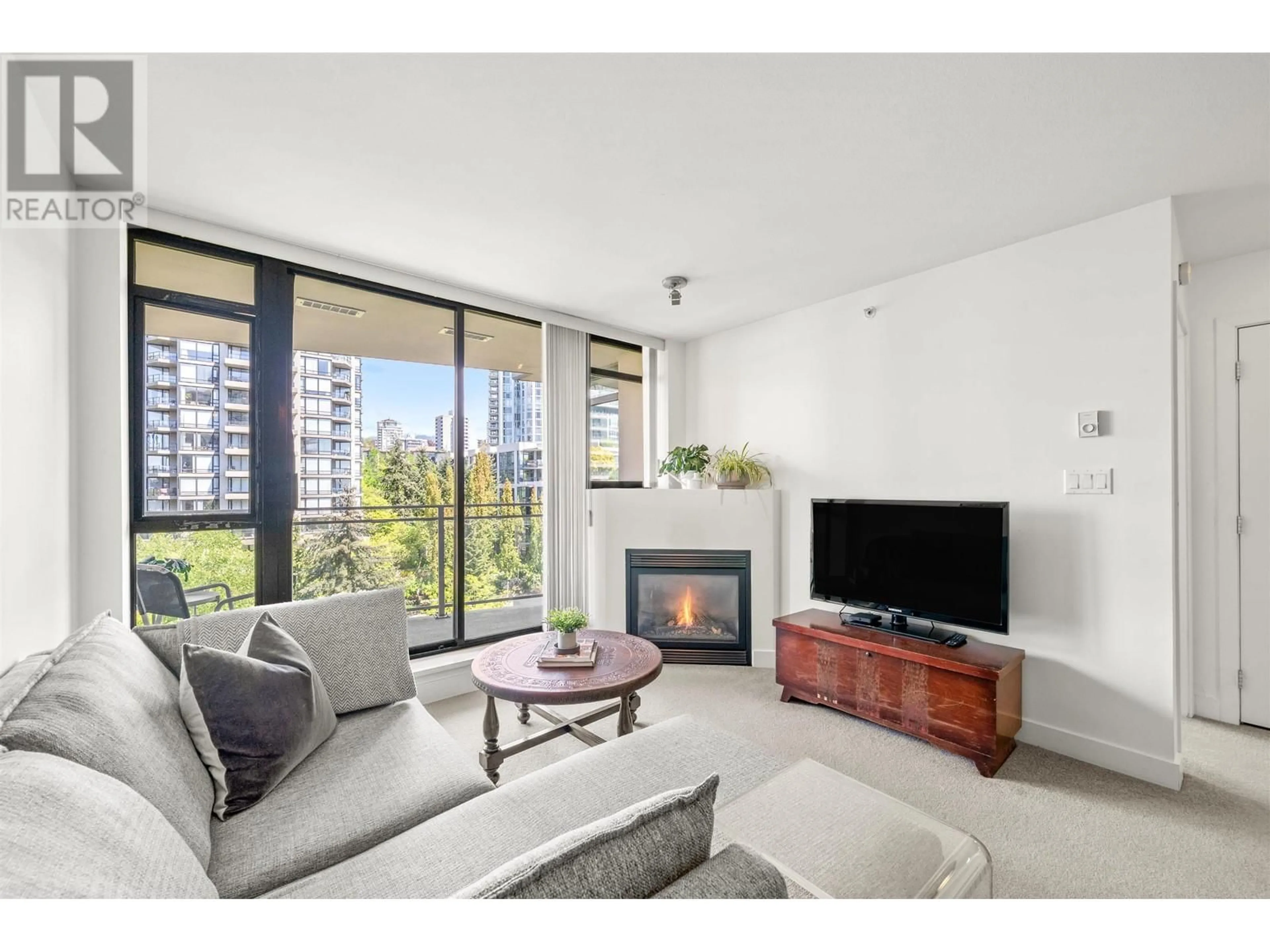 Living room with furniture, unknown for 707 - 155 1ST STREET, North Vancouver British Columbia V7M3N8
