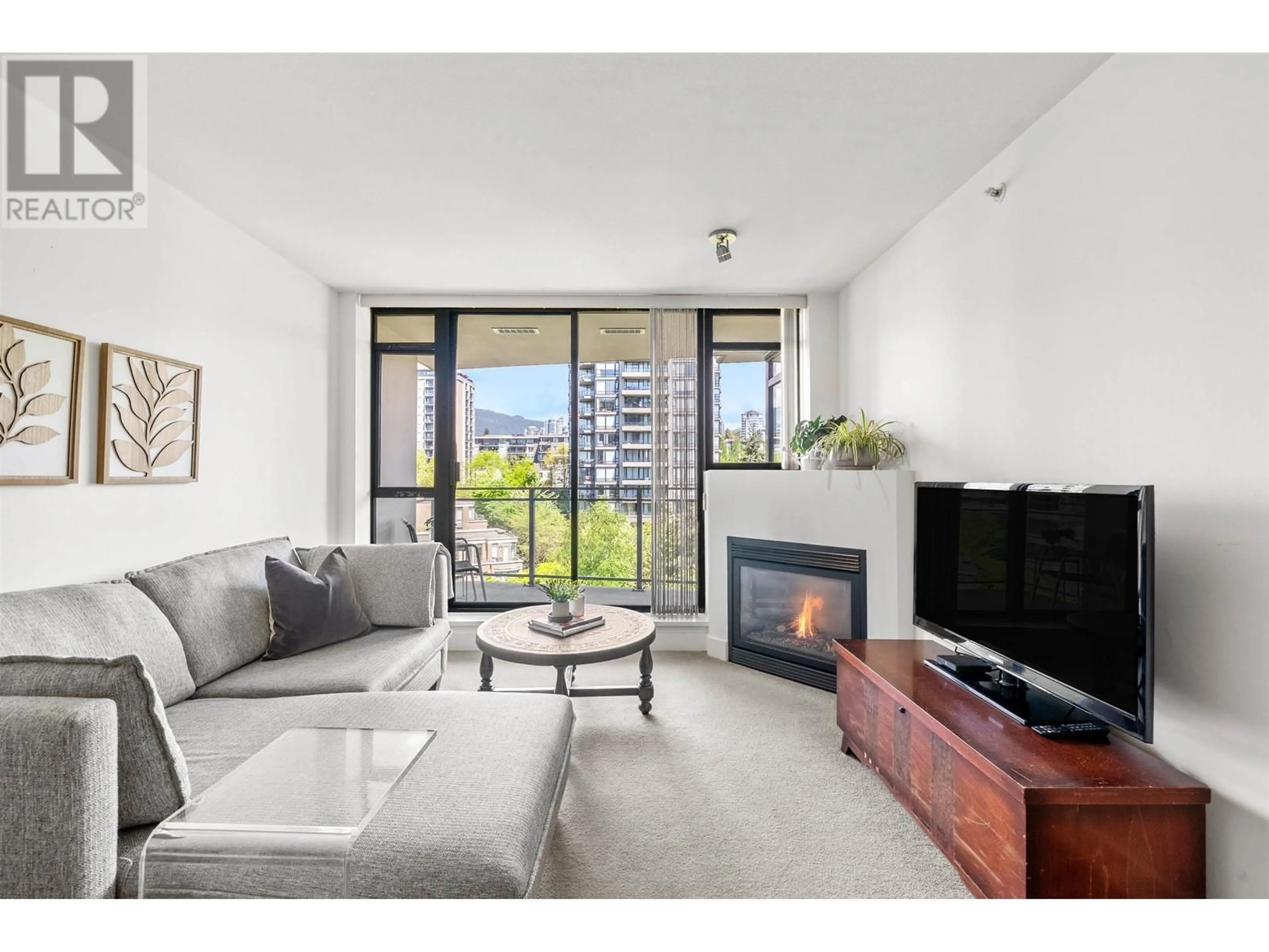 Living room with furniture, unknown for 707 - 155 1ST STREET, North Vancouver British Columbia V7M3N8
