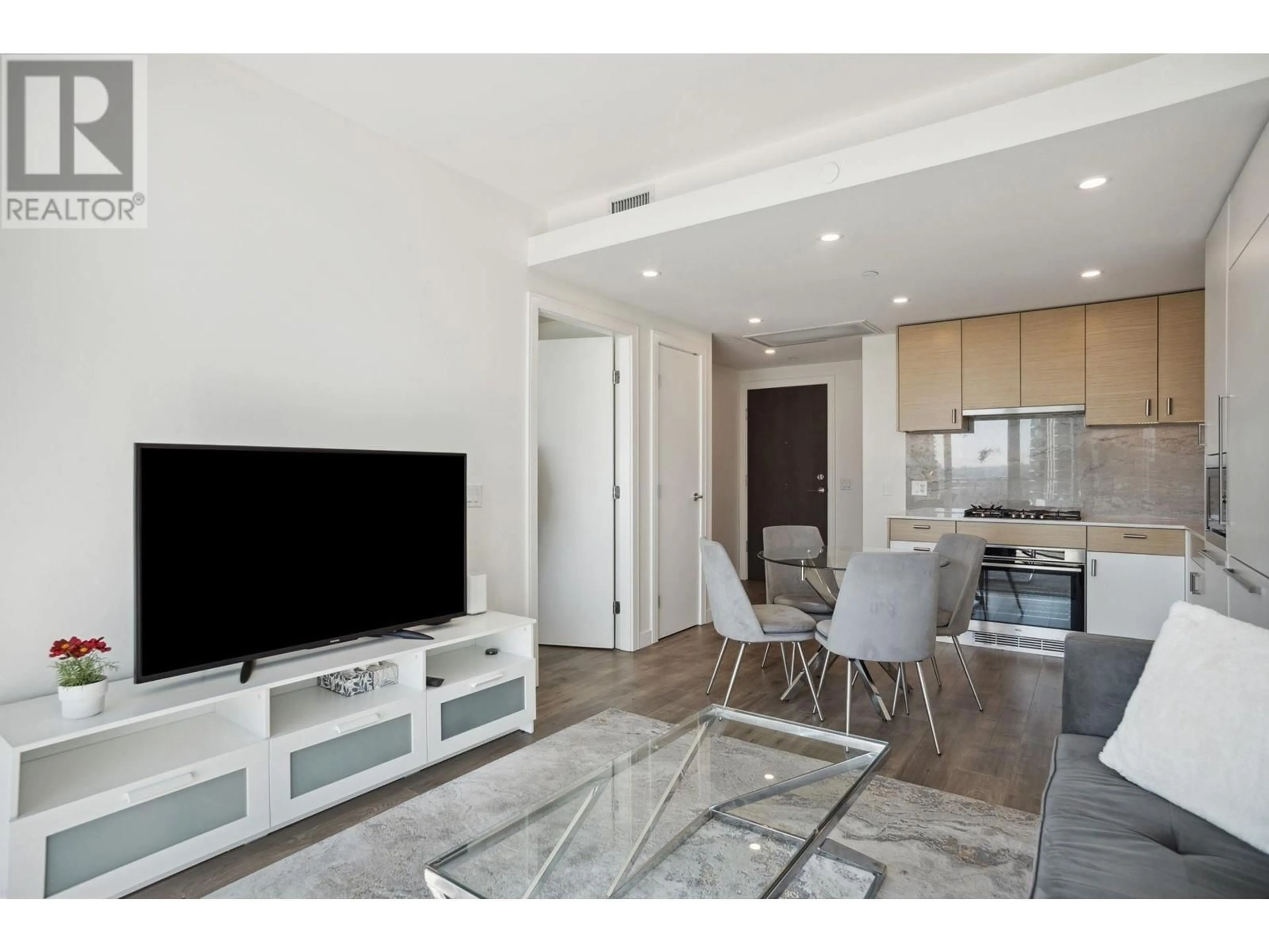 Living room with furniture, unknown for 1503 - 200 KLAHANIE COURT, West Vancouver British Columbia V7P0E4
