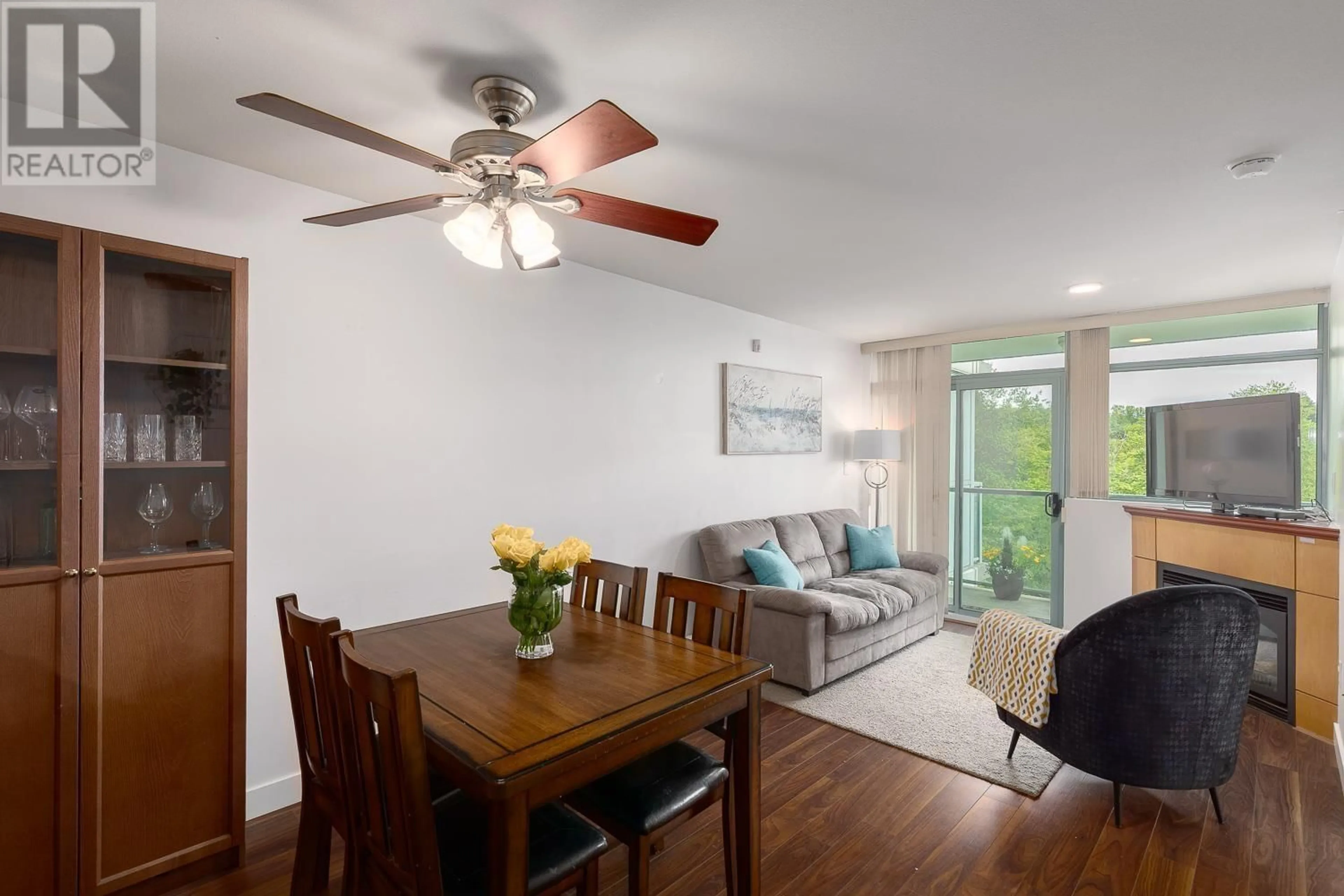 Living room with furniture, wood/laminate floor for 1109 - 2763 CHANDLERY PLACE, Vancouver British Columbia V5S4V4