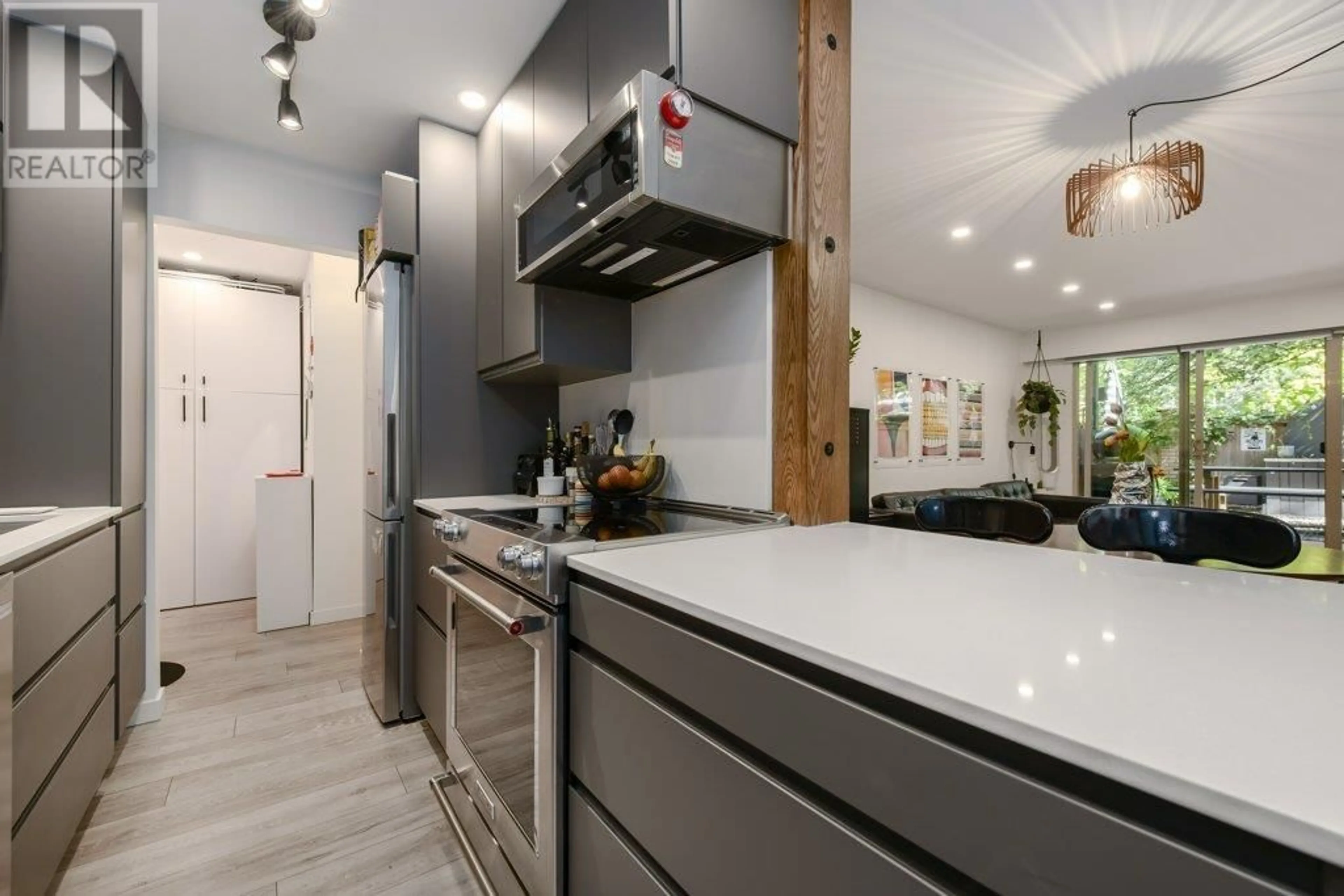Open concept kitchen, unknown for 106 - 225 3RD STREET, North Vancouver British Columbia V7M1E9