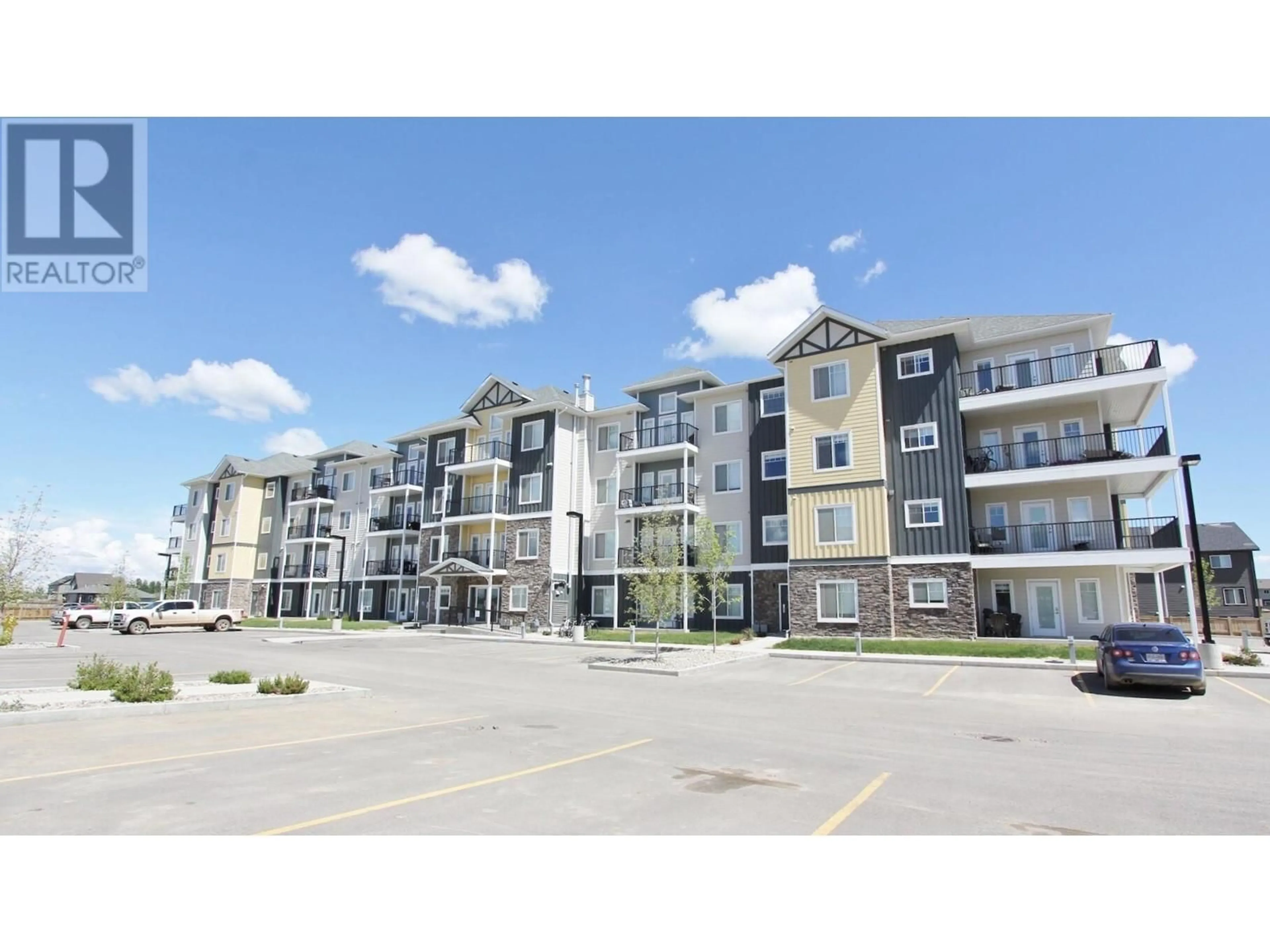 A pic from outside/outdoor area/front of a property/back of a property/a pic from drone, building for 112 - 11203 105 AVENUE, Fort St. John British Columbia V1J0L3