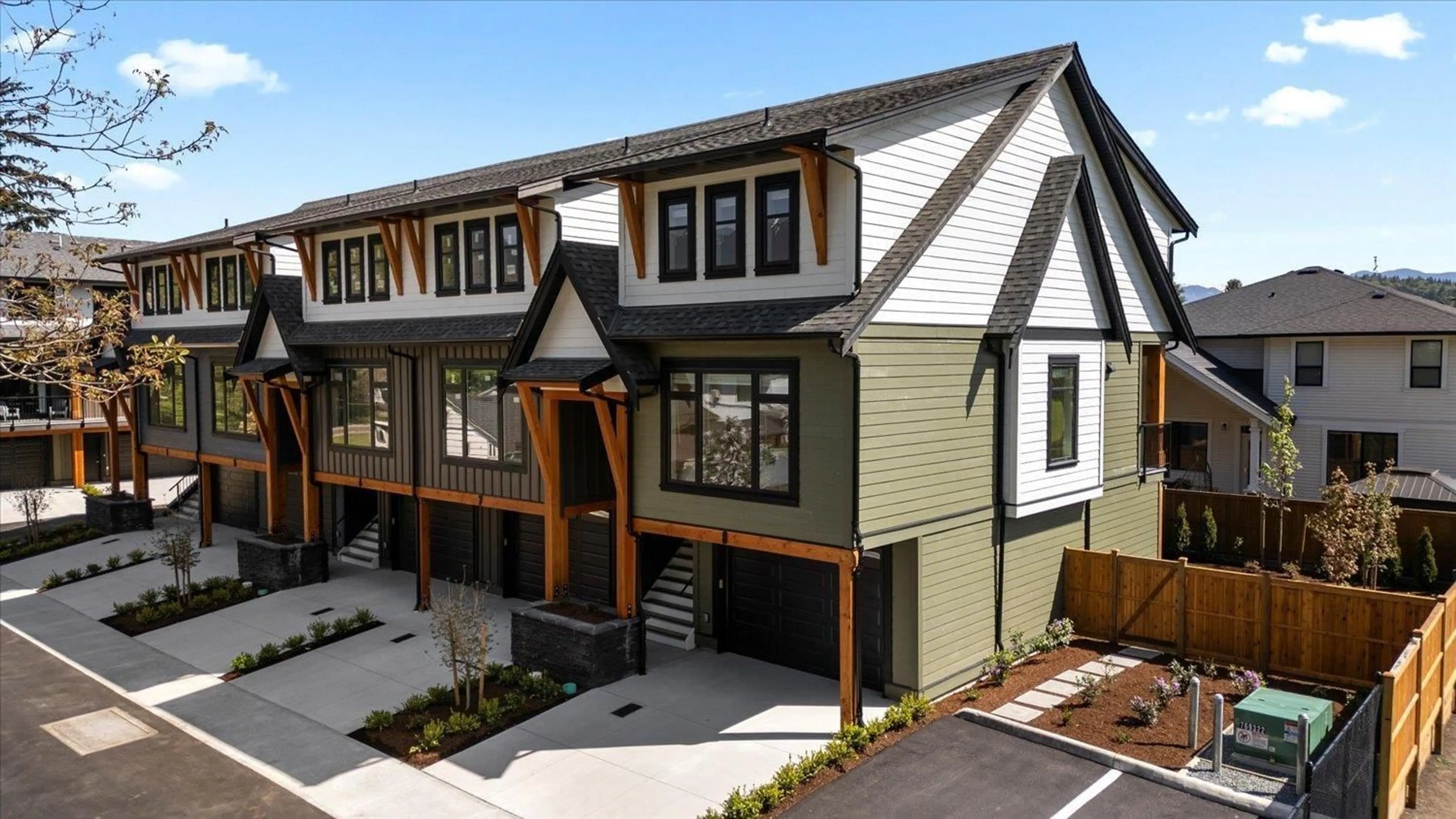 Home with vinyl exterior material, street for 4 - 46106 RIVERSIDE DRIVE, Chilliwack British Columbia V2P3K9