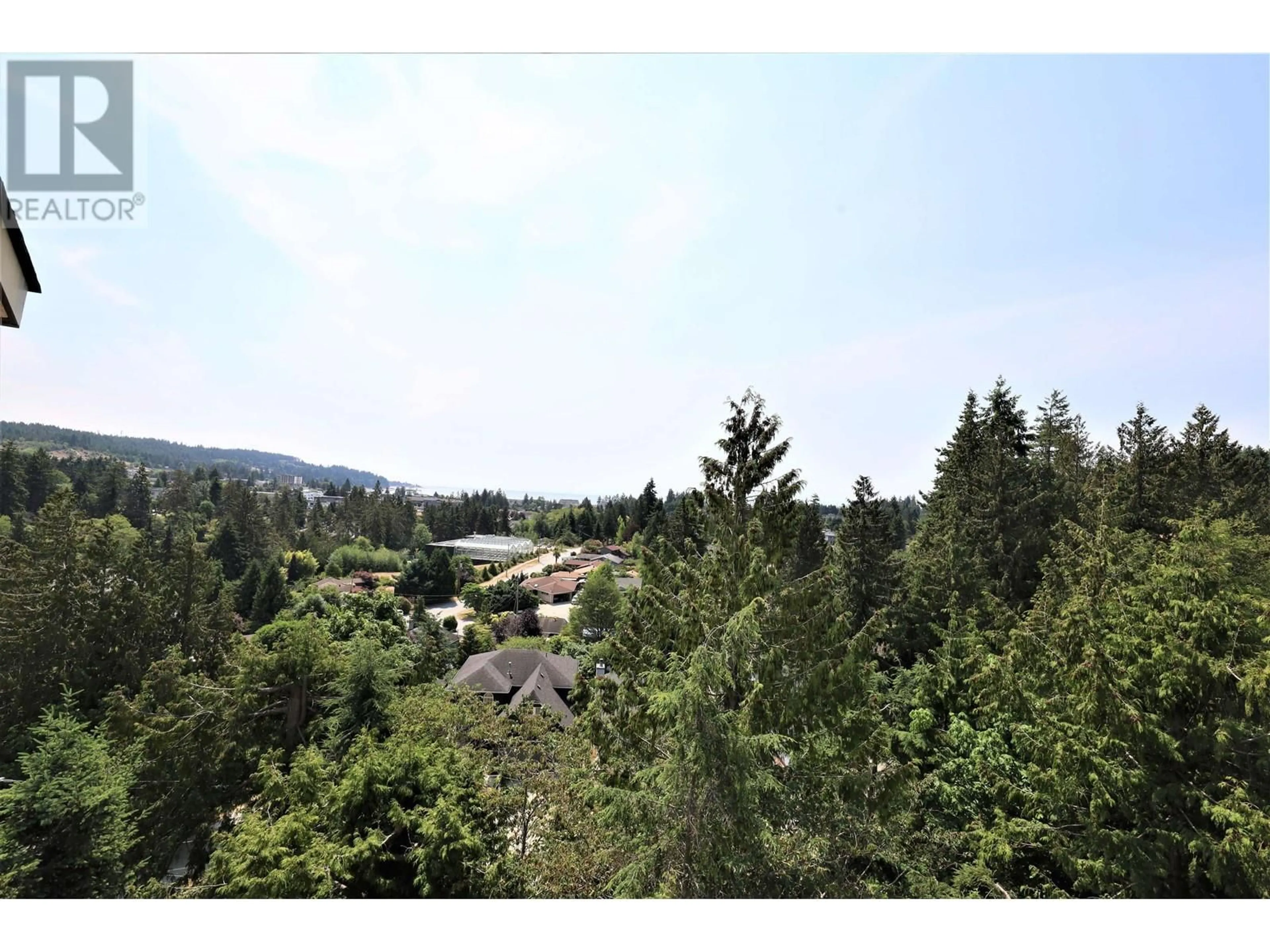 A pic from outside/outdoor area/front of a property/back of a property/a pic from drone, forest/trees view for 7 - 5746 MARINE WAY, Sechelt British Columbia V7Z0L8