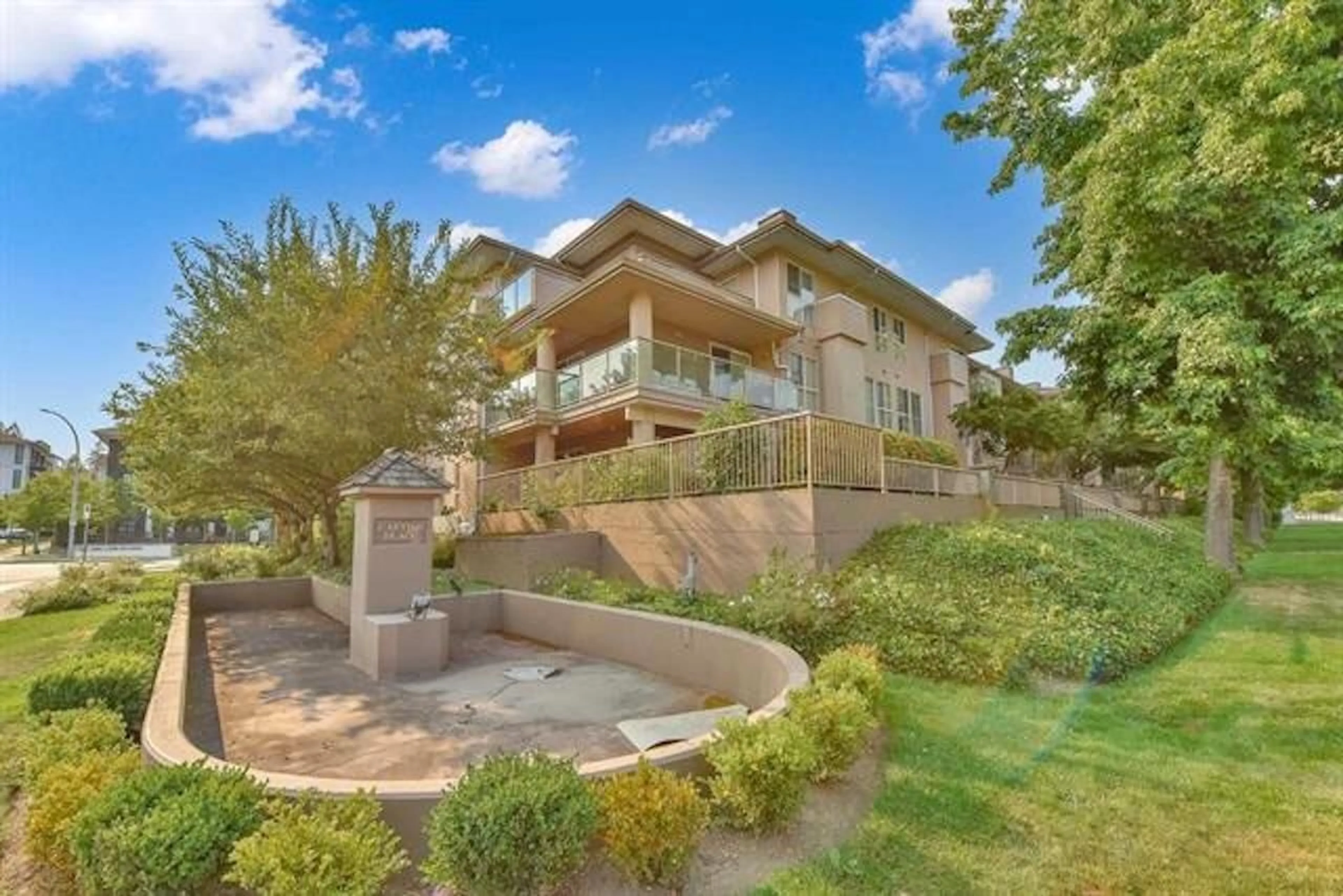 A pic from outside/outdoor area/front of a property/back of a property/a pic from drone, unknown for 104 - 14993 101A, Surrey British Columbia V3R0T1