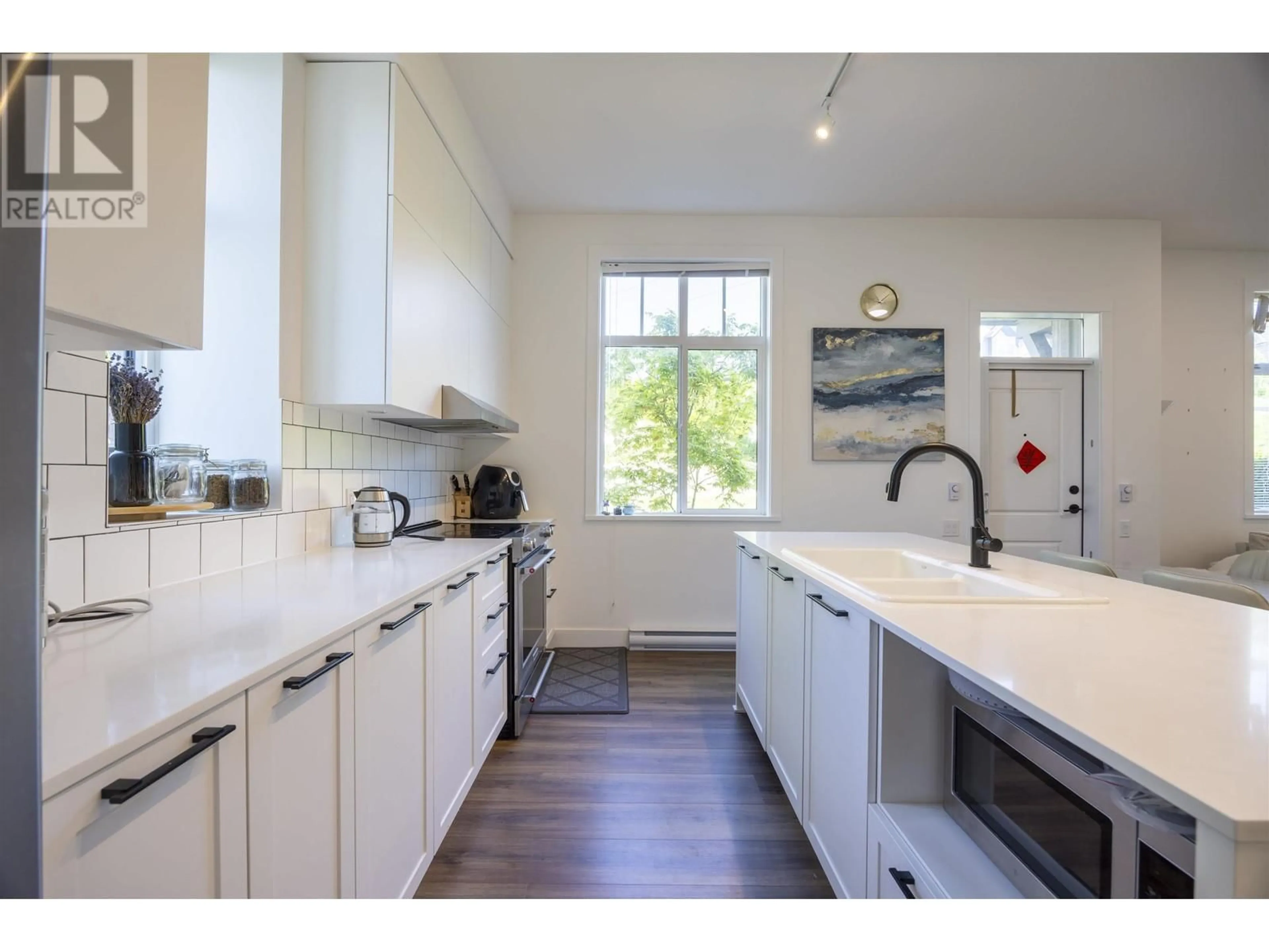 Open concept kitchen, unknown for 101 - 3517 BAYCREST AVENUE, Coquitlam British Columbia V3B0S3