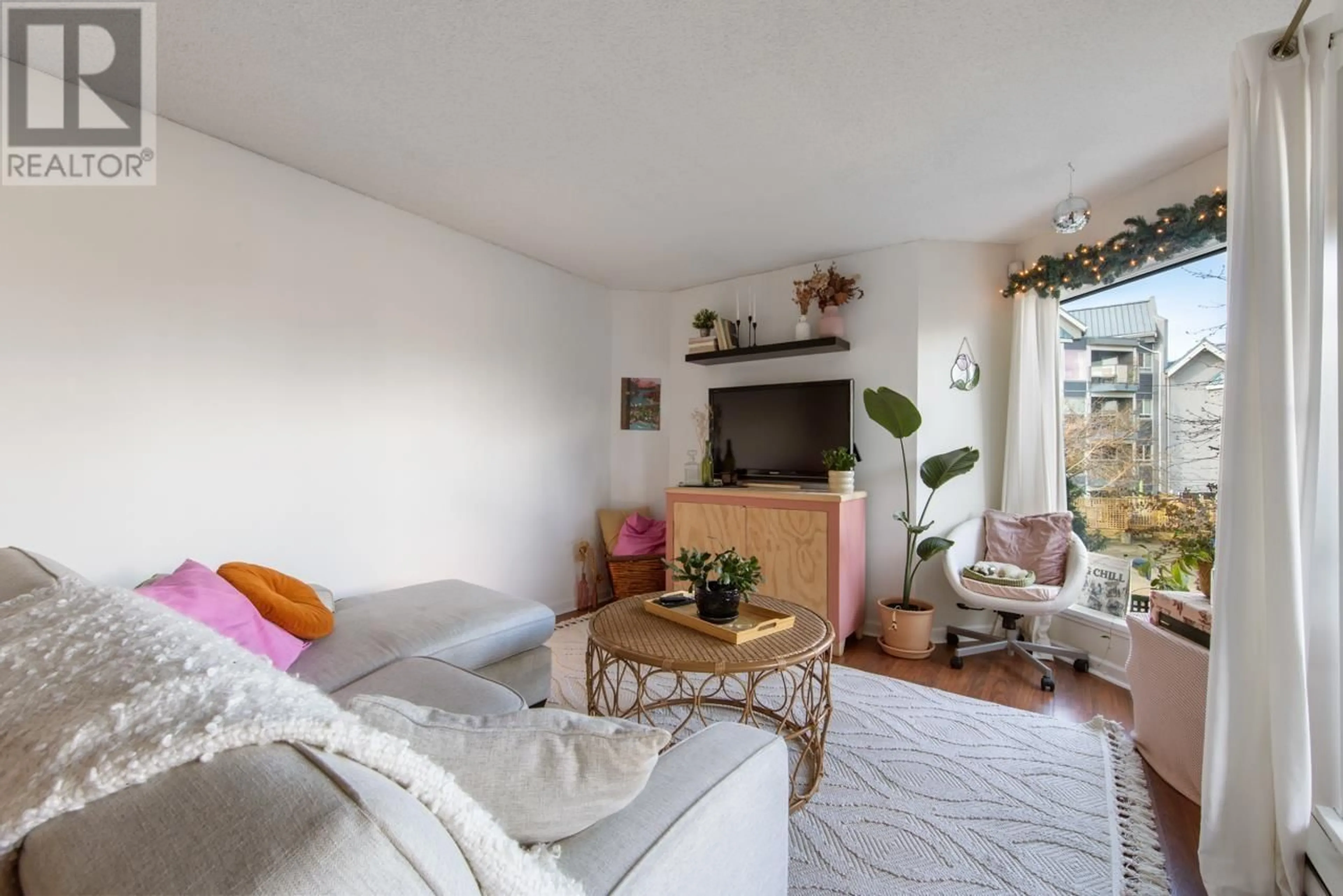 Living room with furniture, unknown for 205 - 1345 4TH AVENUE, Vancouver British Columbia V6H3Y8