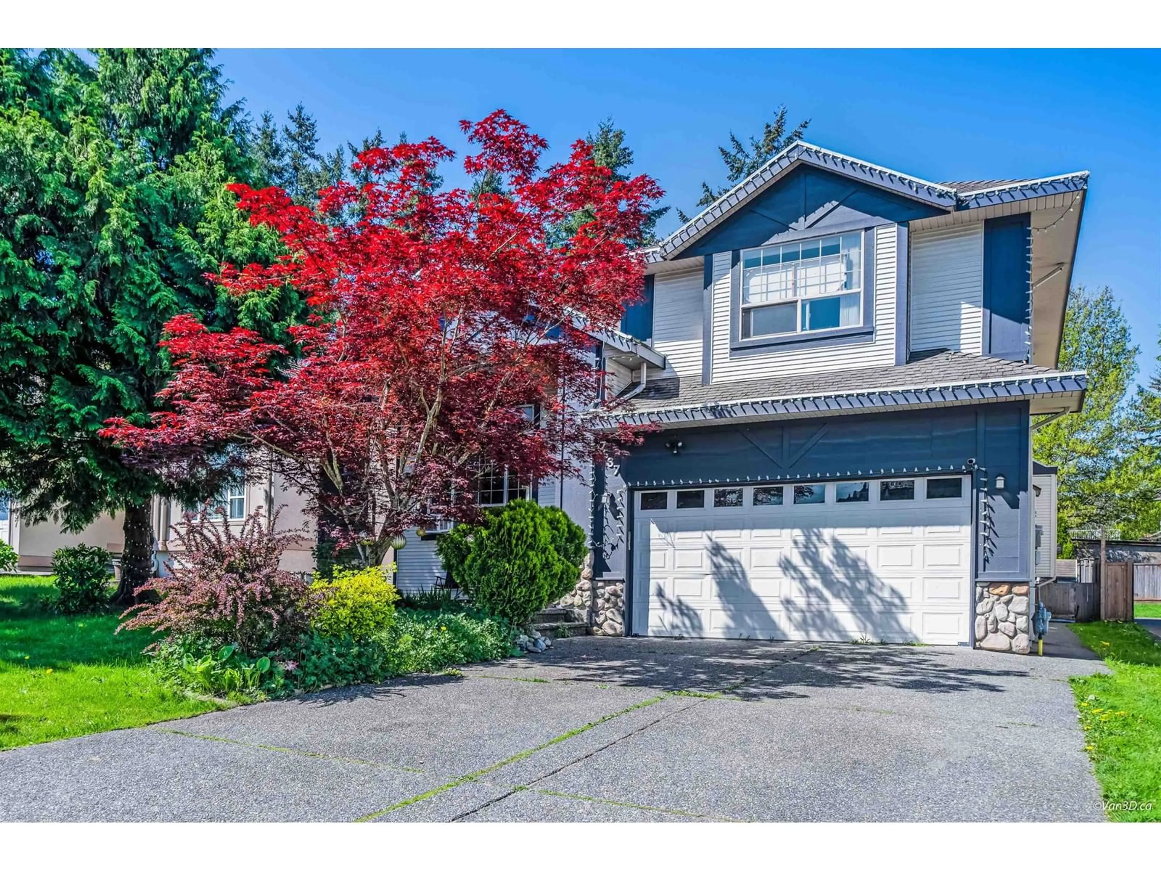 Home with vinyl exterior material, street for 7667 147A, Surrey British Columbia V3S8Z3