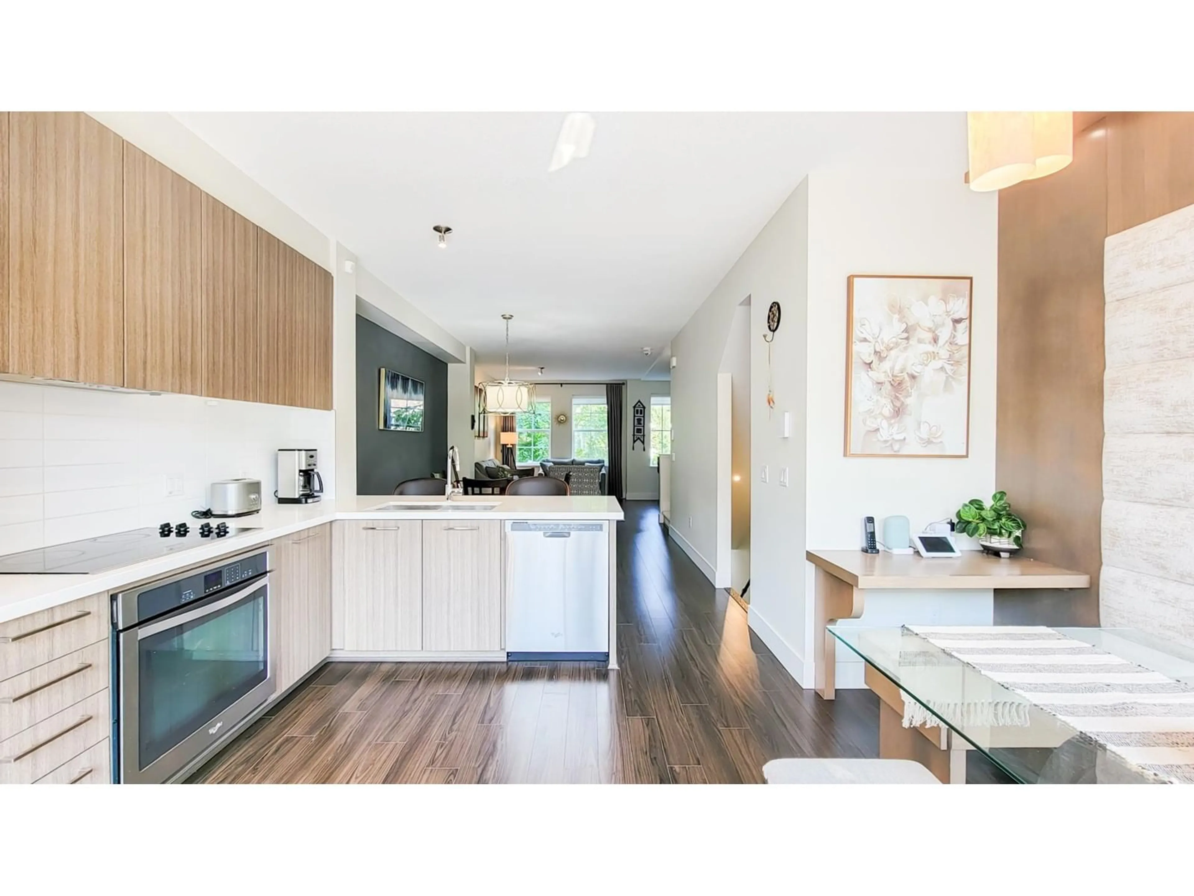 Open concept kitchen, wood/laminate floor for 12 - 3399 151, Surrey British Columbia V3Z0L3