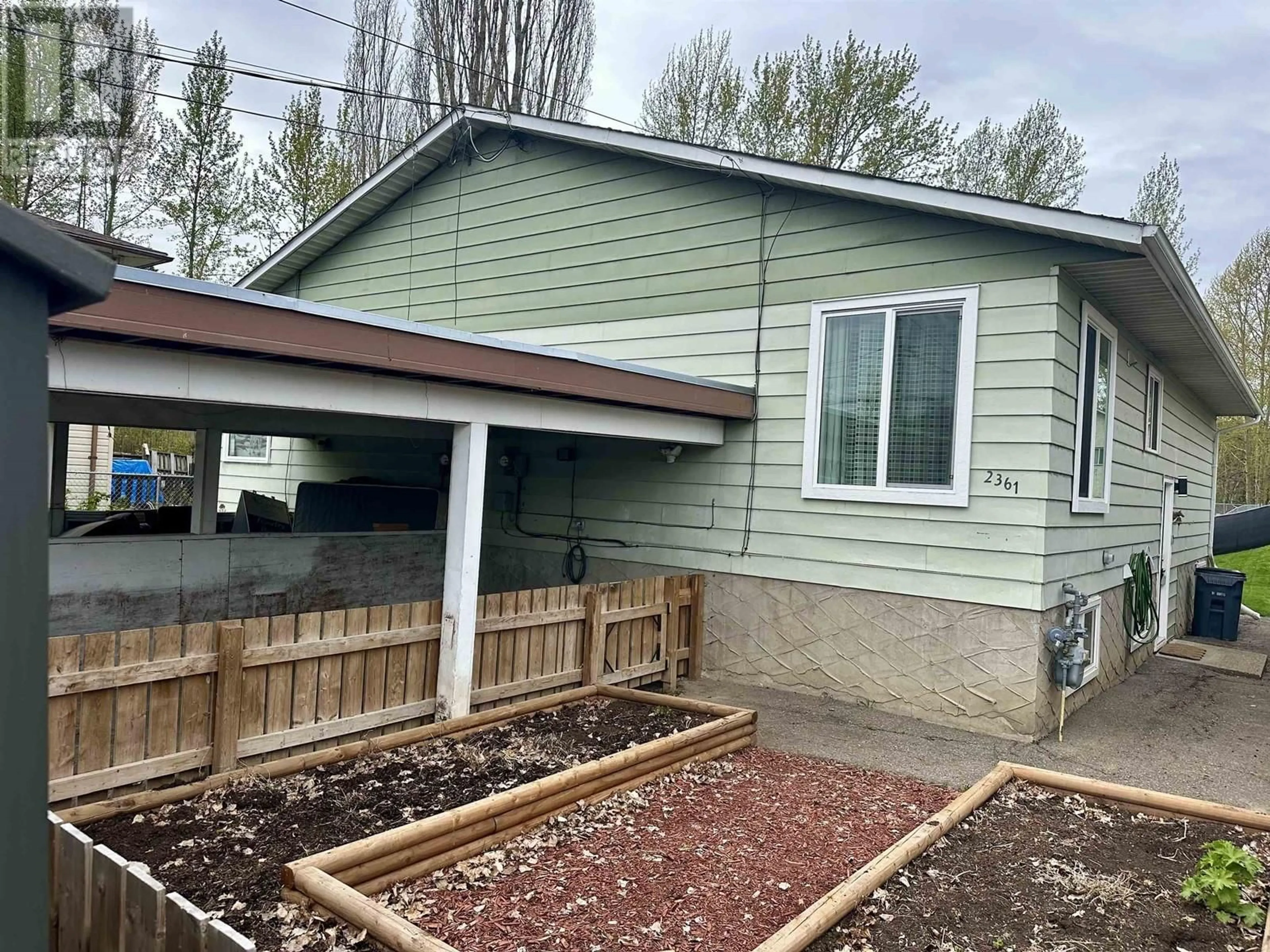 Home with vinyl exterior material, street for 2361 QUINCE STREET, Prince George British Columbia V2L5A8