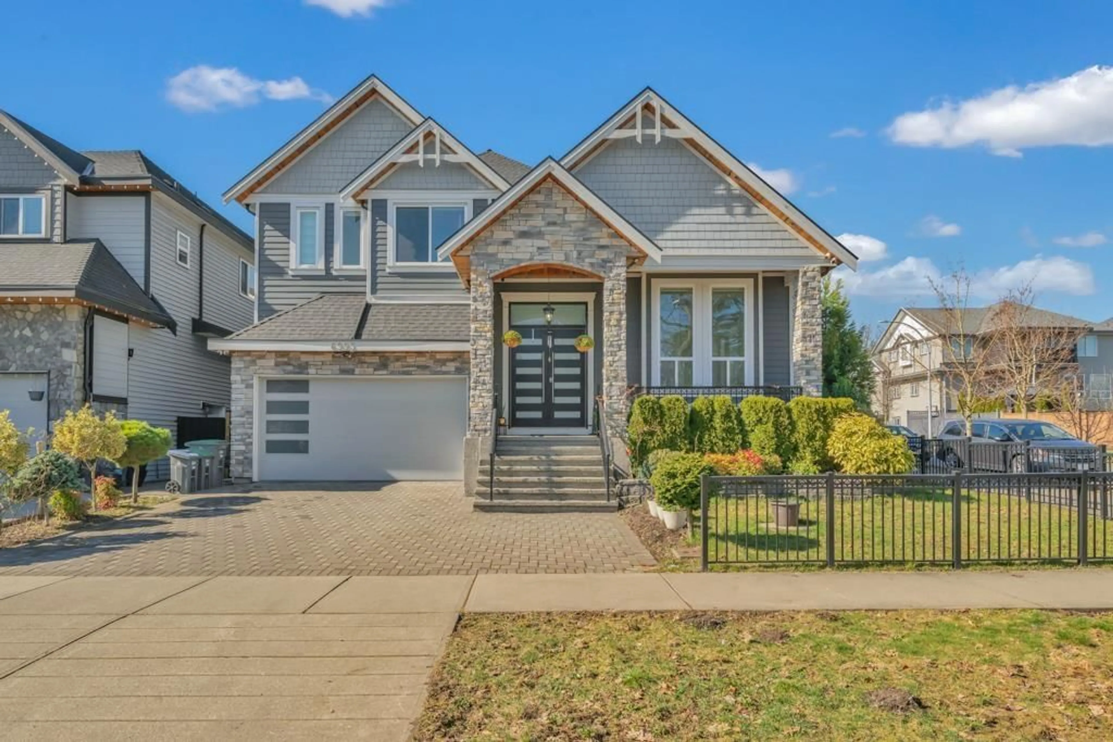 Home with vinyl exterior material, street for 6993 149A, Surrey British Columbia V3S1K2