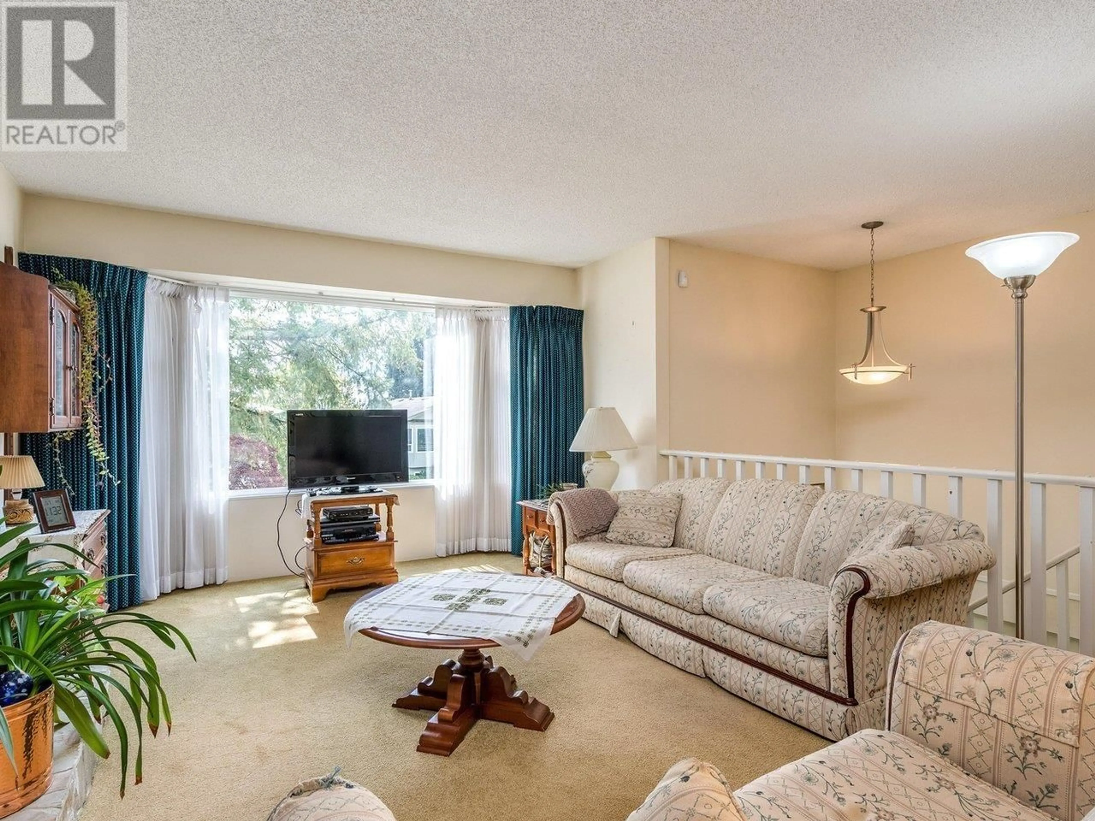 Living room with furniture, unknown for 1409 GABRIOLA DRIVE, Coquitlam British Columbia V3E2B9