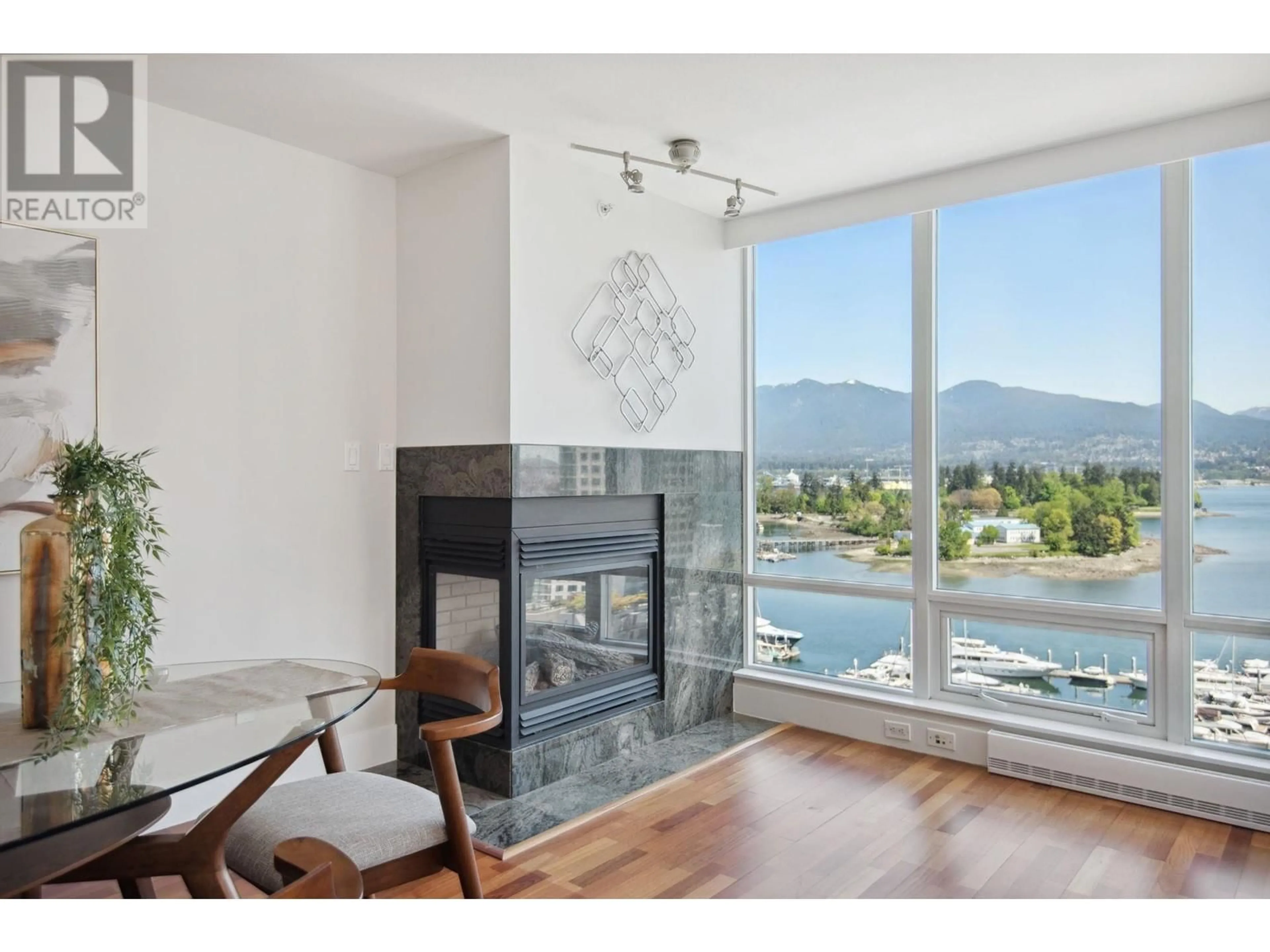 Living room with furniture, wood/laminate floor for 1402 - 499 BROUGHTON STREET, Vancouver British Columbia V6G3K1