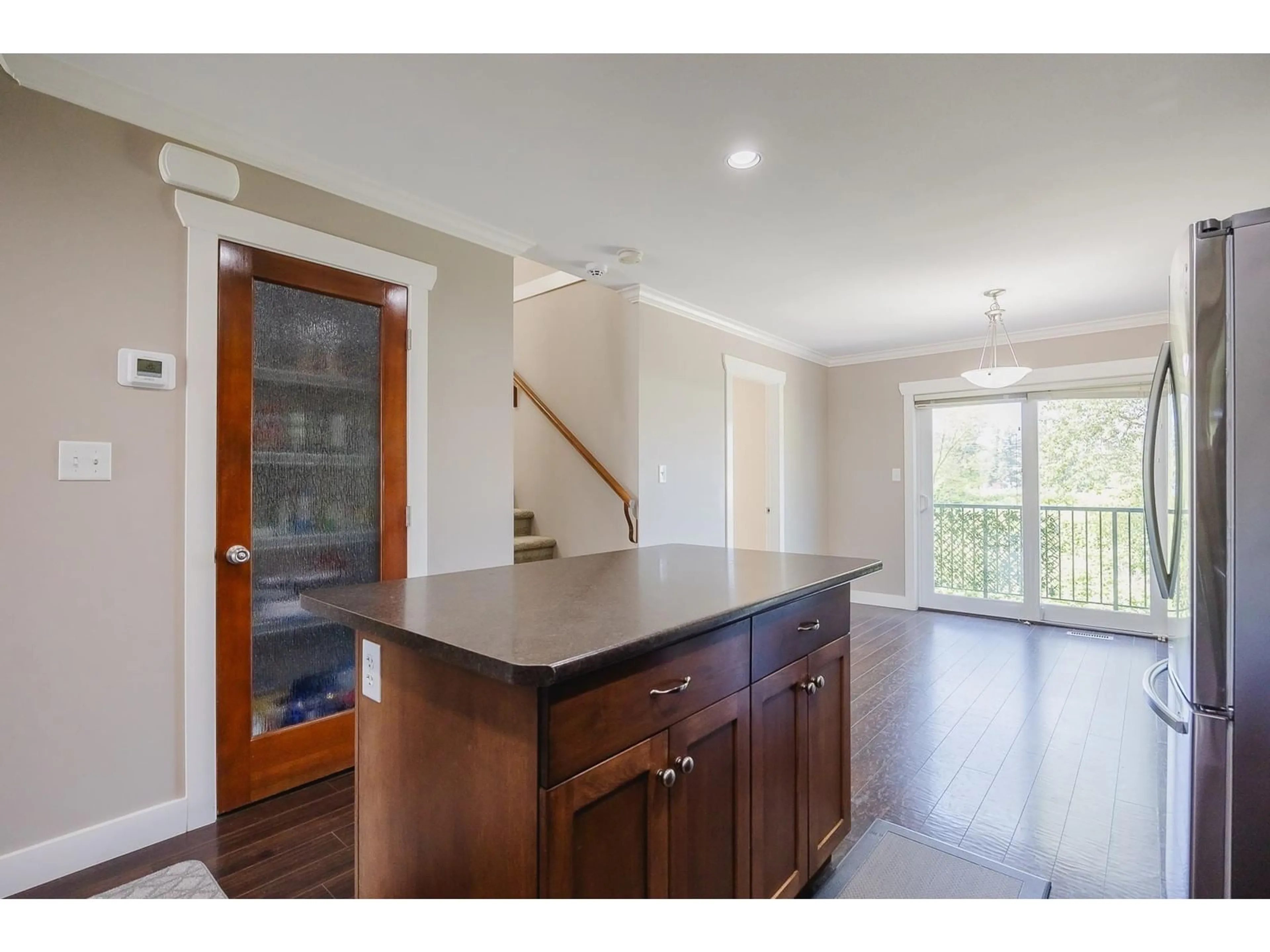 Open concept kitchen, wood/laminate floor for 24 - 45085 WOLFE ROAD, Chilliwack British Columbia V2P0C5