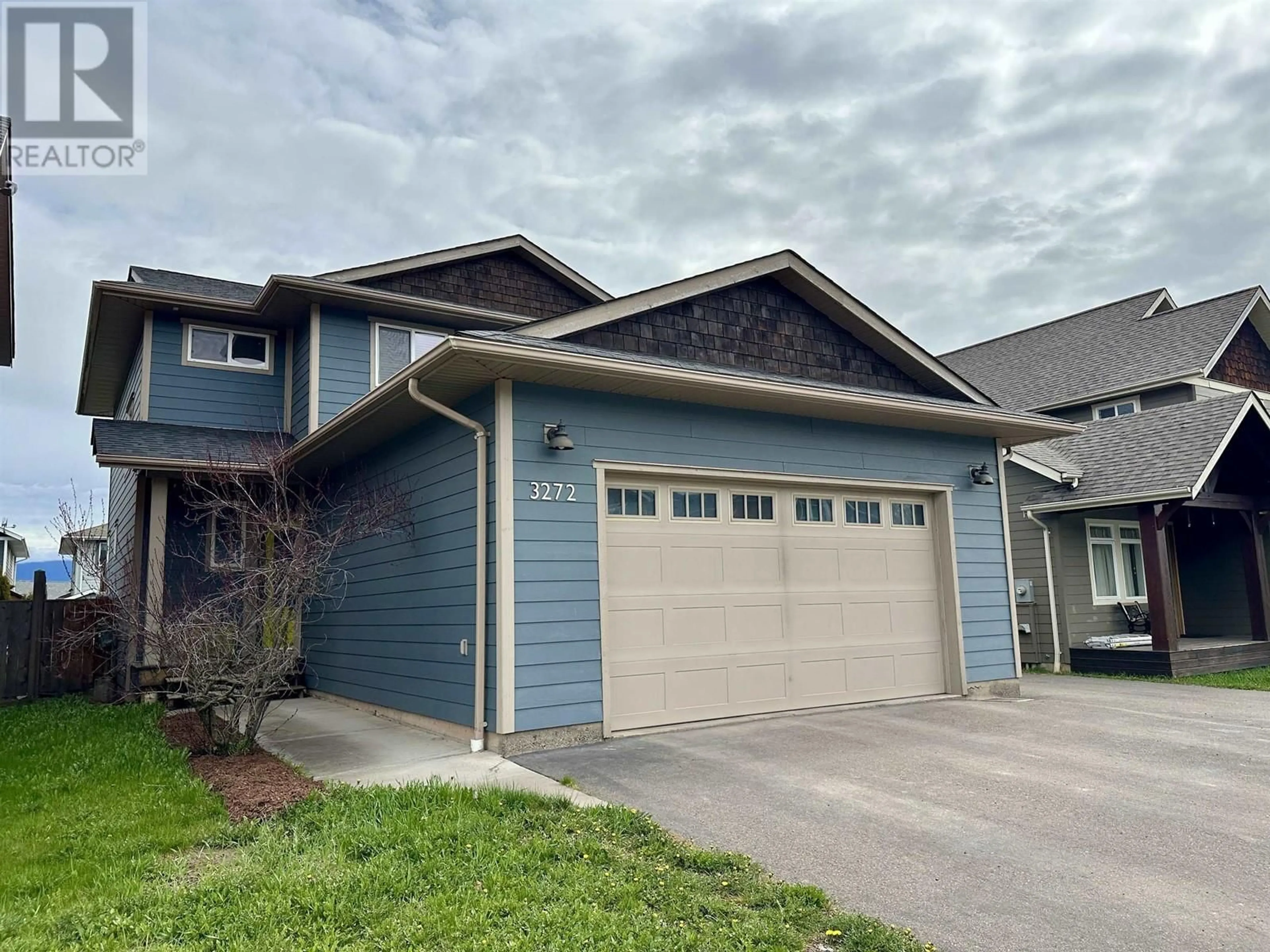 Home with vinyl exterior material, street for 3272 TURNER WAY, Smithers British Columbia V0J2N0